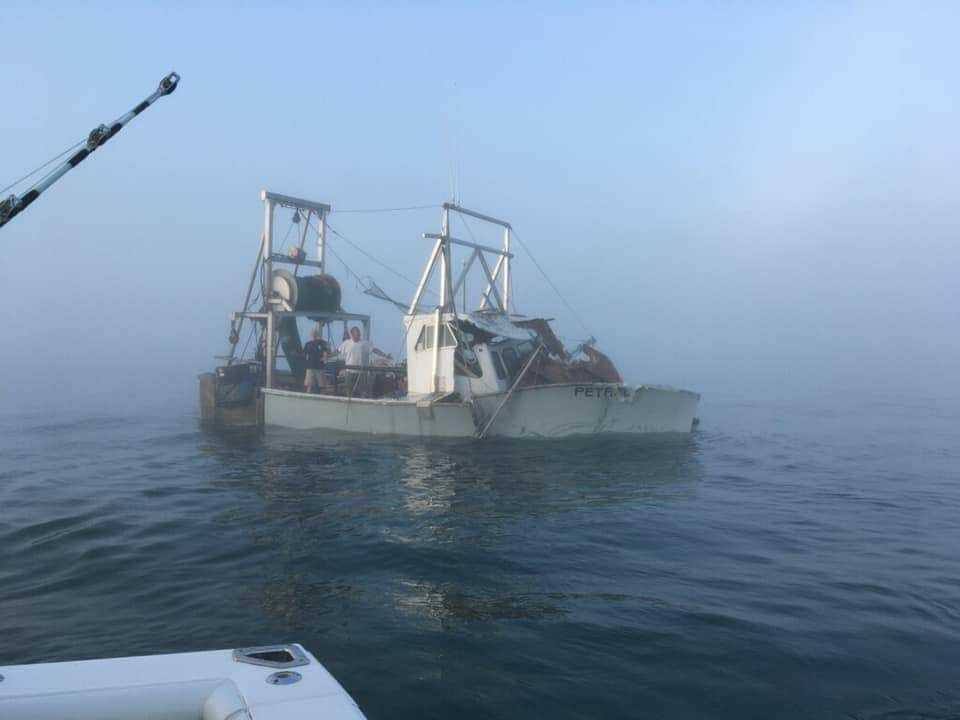 A photo of the Petrel immediately after it was struck on Saturday morning by another boat in heavy fog. The Petrel sunk less than three minutes later. Both the crewmen were rescued by the other boat. 