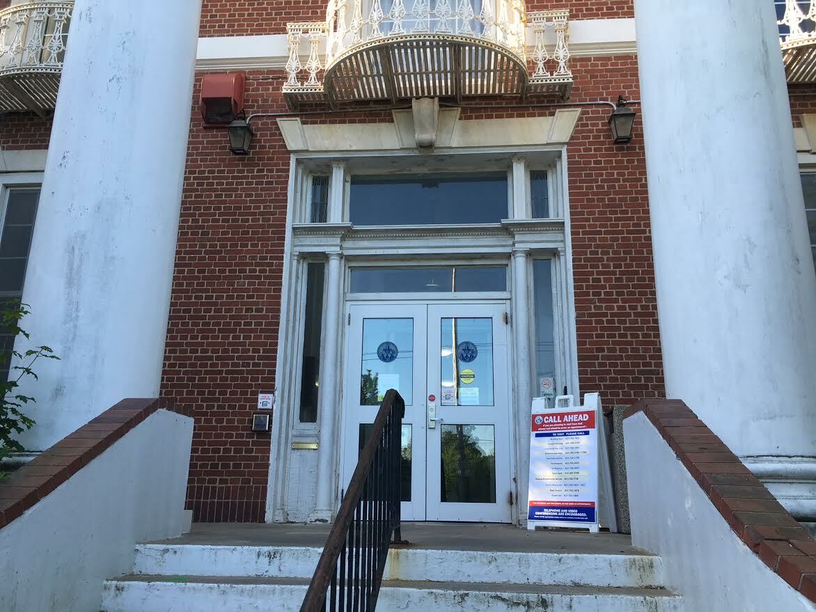 The closure of Southampton Town Hall, part of the mandated NY PAUSE, which shut all but essential businesses for weeks, meant a substantial, but surmountable, hit to the town budget.  KITTY MERRILL