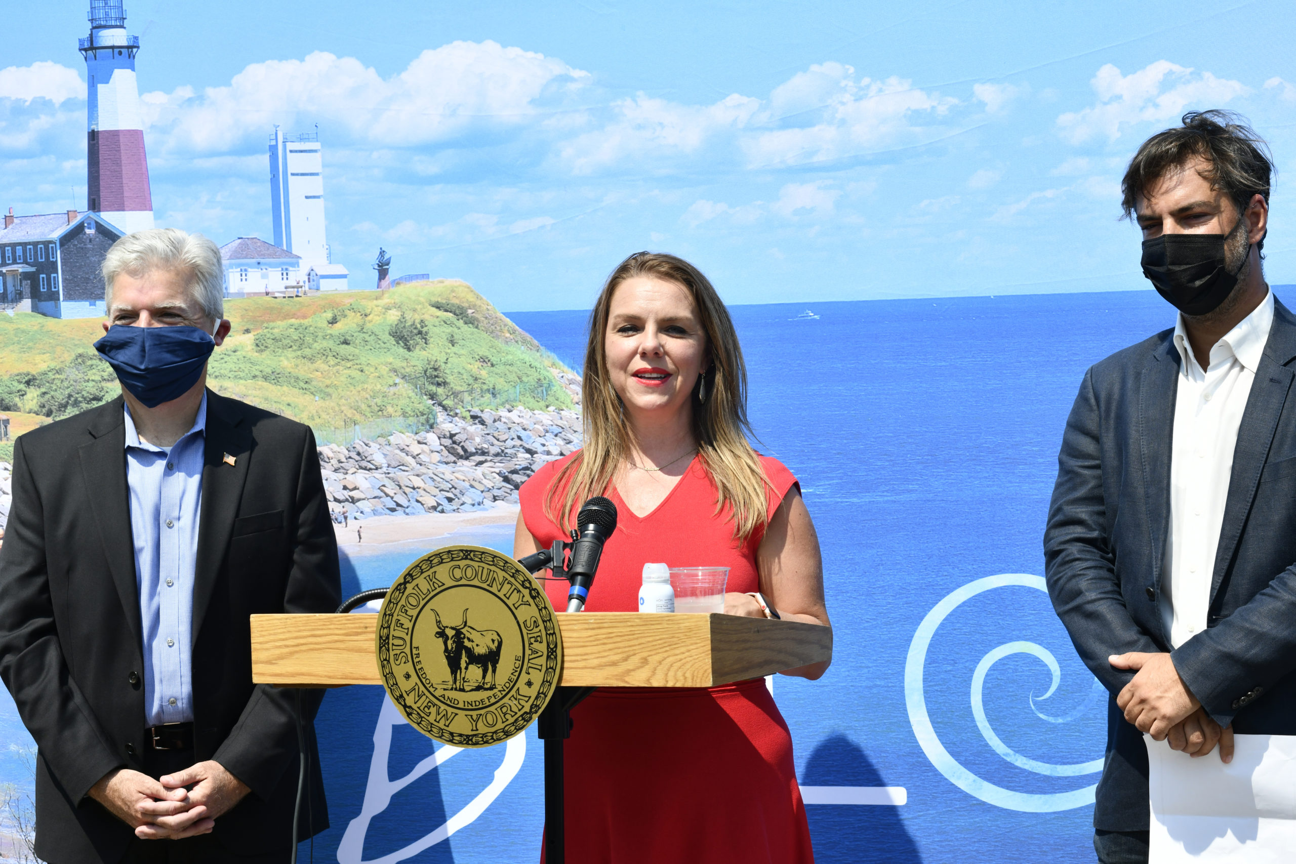 Suffolk County Executive Steve Bellone and Discover Long Island President, CEO Kristen Jarnagin and Michael Pitsinos, owner, NAIA Hamptons.   DANA SHAW