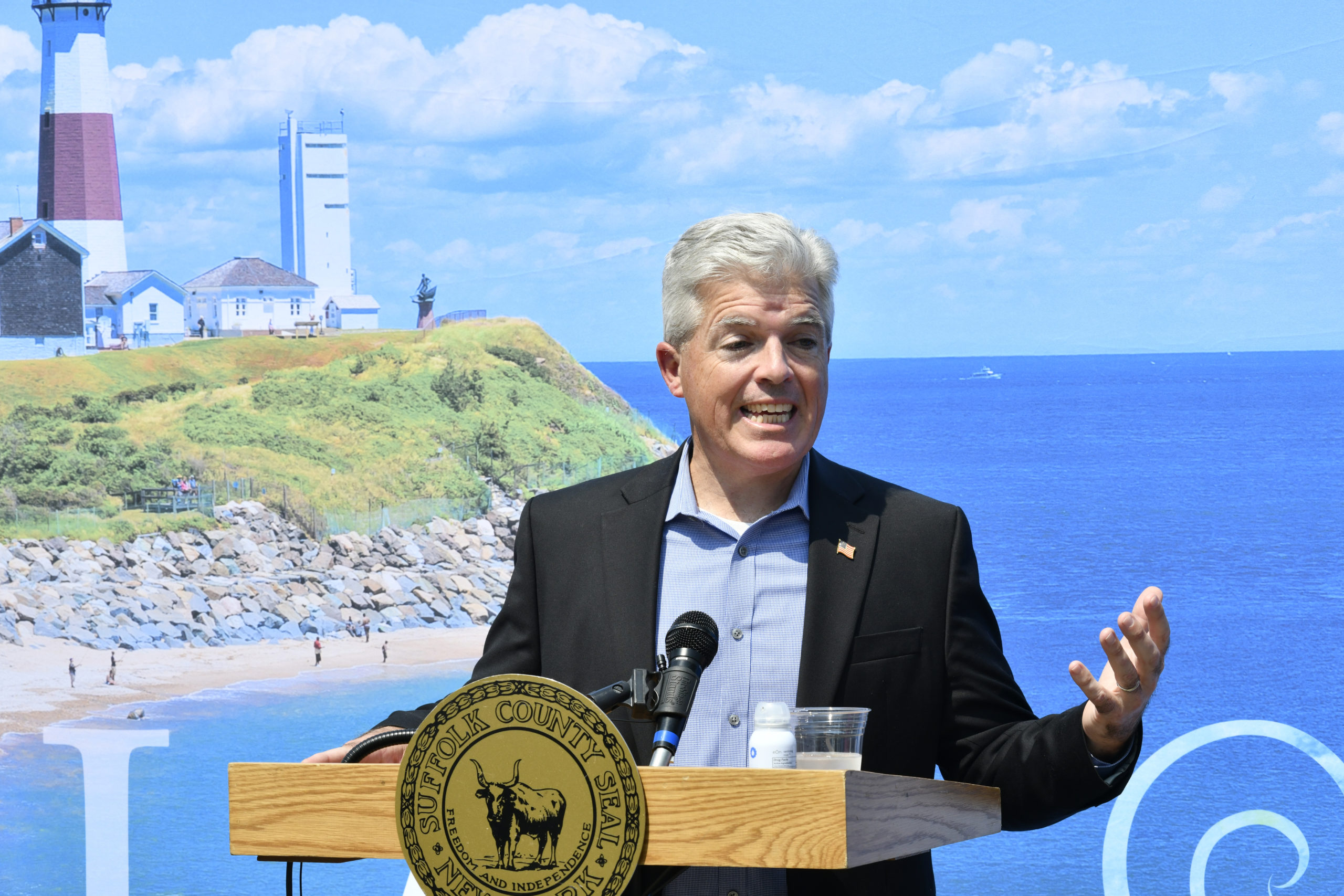 Suffolk County Executive Steve Bellone speaks at the Capri Hotel in Southampton on Thursday afternoon.  DANA SHAW