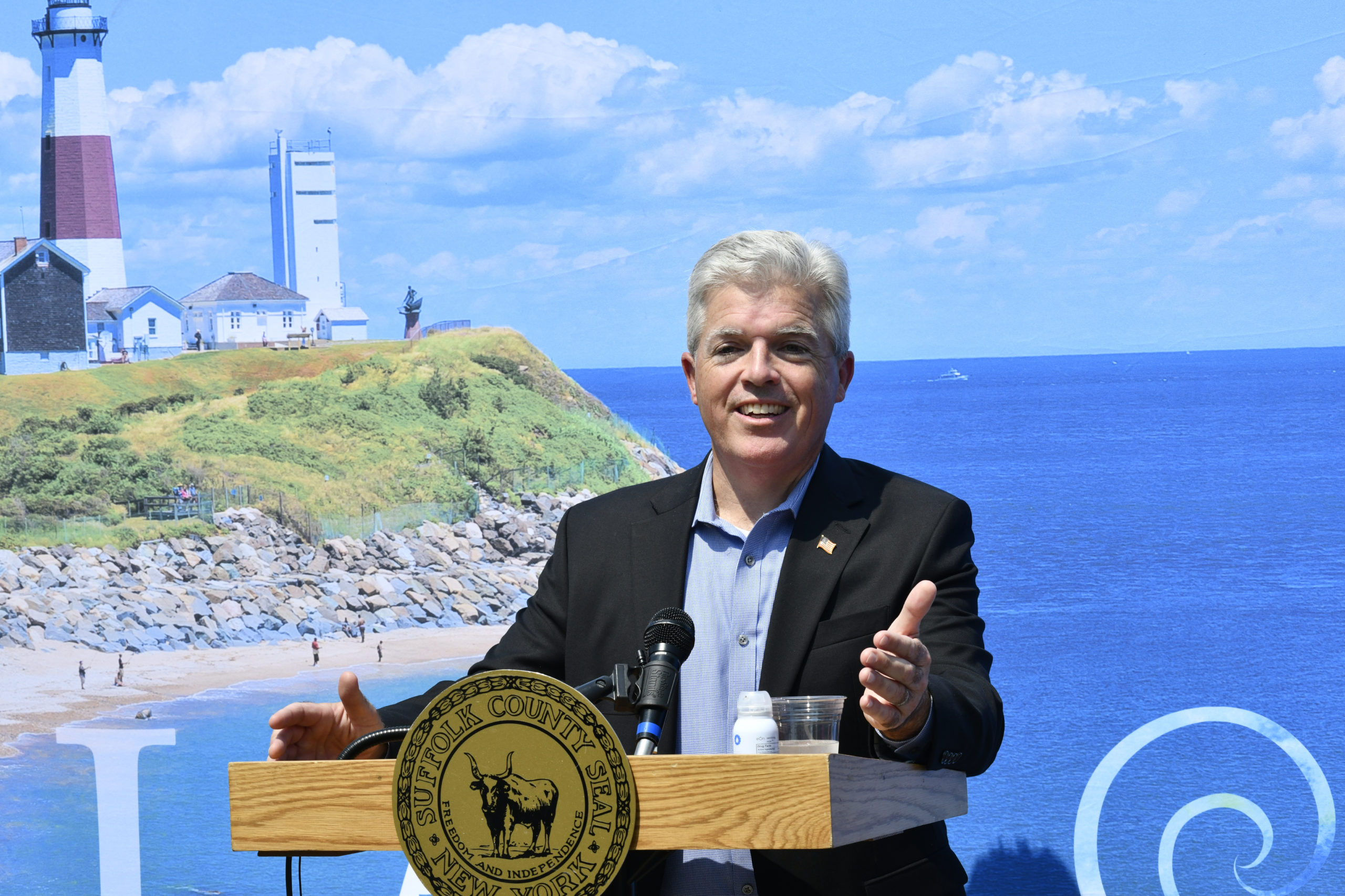 Suffolk County Executive Steve Bellone speaks at the Capri Hotel in Southampton on Thursday afternoon.  DANA SHAW