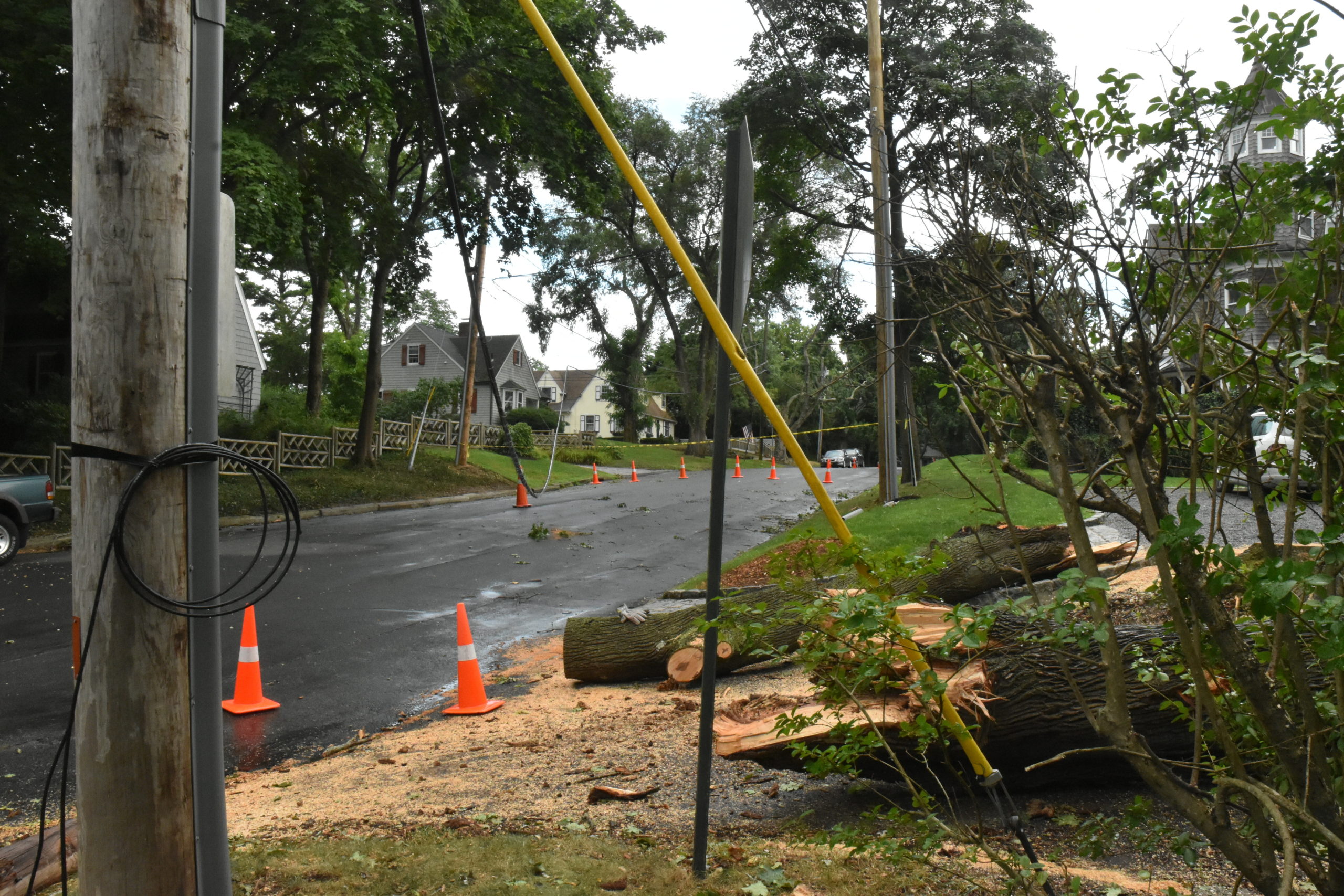Rysam Street in Sag Harbor remained closed to traffic on Friday, August 7, three days after Tropical Storm Isaias blew down limbs that brought down power lines. PSEG - Long Island has come under criticism from elected offiicals over its response to the storm. STEPHEN J. KOTZ