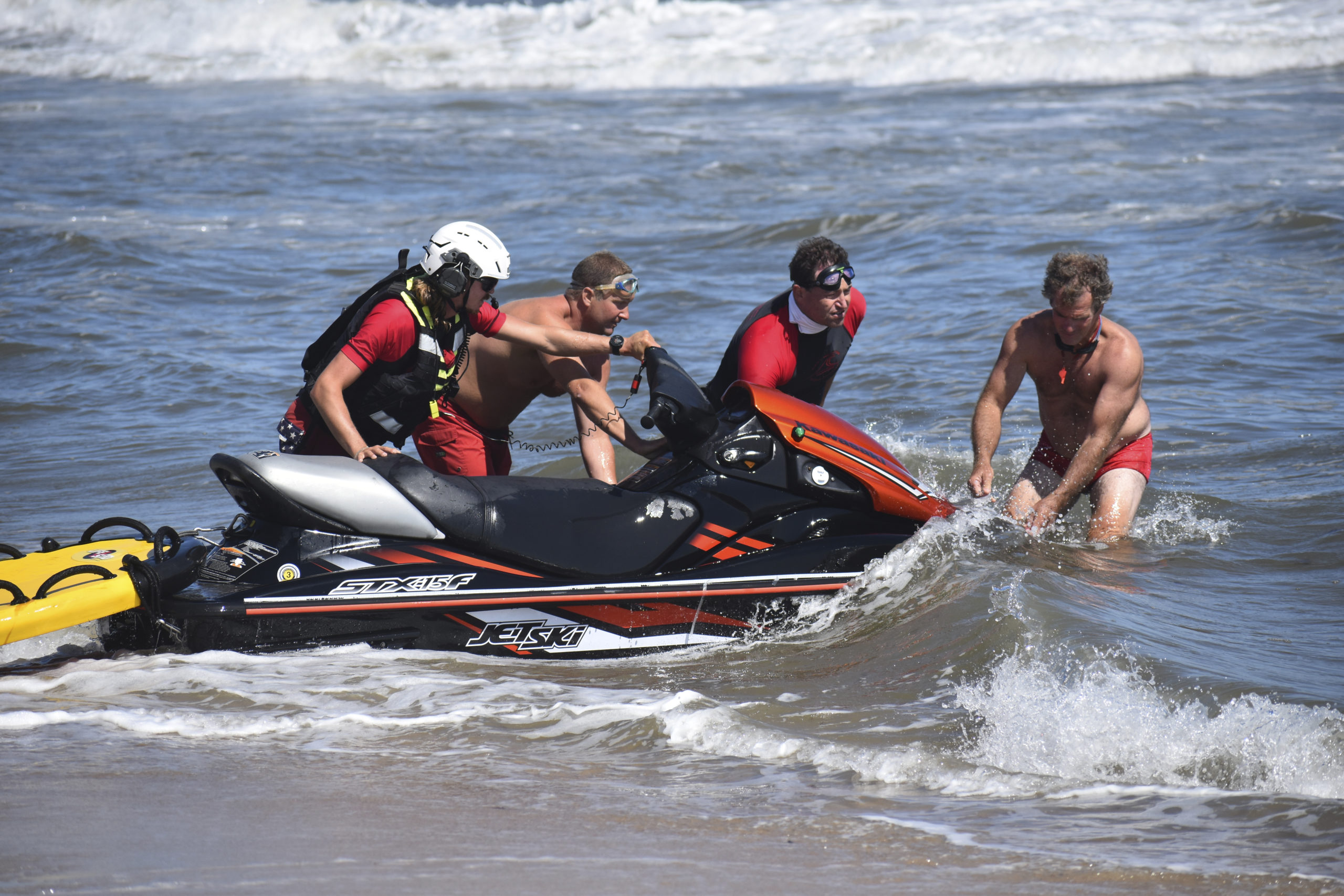 East Hampton Volunteer Ocean Rescue, police and the U.S. Coast Guard search the ocean off Napeague for a missing swimmer Byron Dong Ha Kim on Tuesday, August 19.  GAVIN MENU