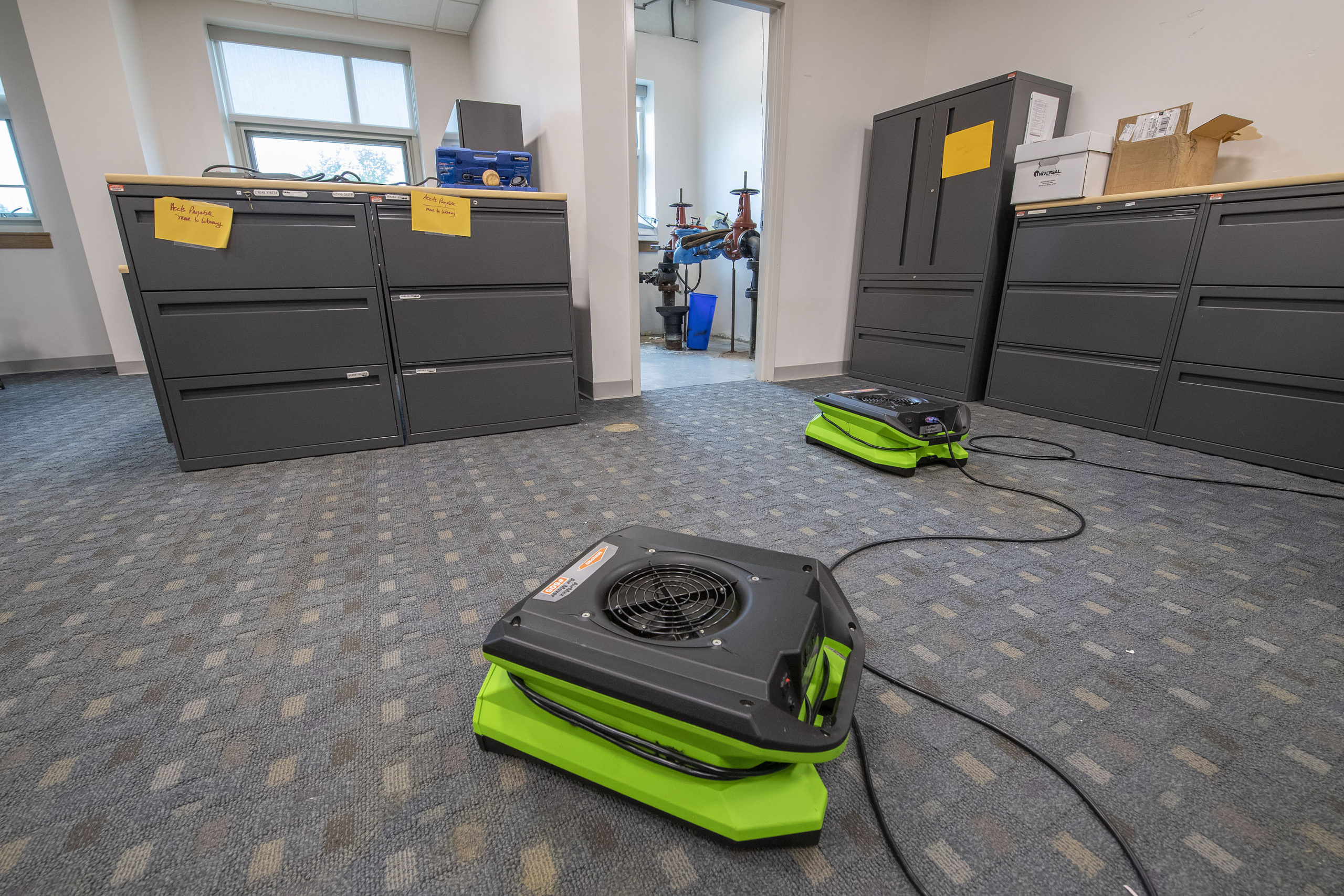 Carpeting and drywall in the East Hampton School District's administrative offices will have to be replaced after a flood caused by a broken water pipe over the weekend. MICHAEL HELLER