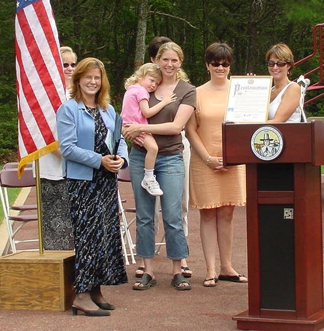 At the opening of Foster Avenue Park in Hampton Bays in 2001. From left: Then-Southampton Town Councilwoman Linda Kabot and Hampton Bays Mothers Association members Kerrie WIlkie with daughter Kate, Monica Hanes, and Julie Lofstad. COURTESY KRISTIN DOULOS