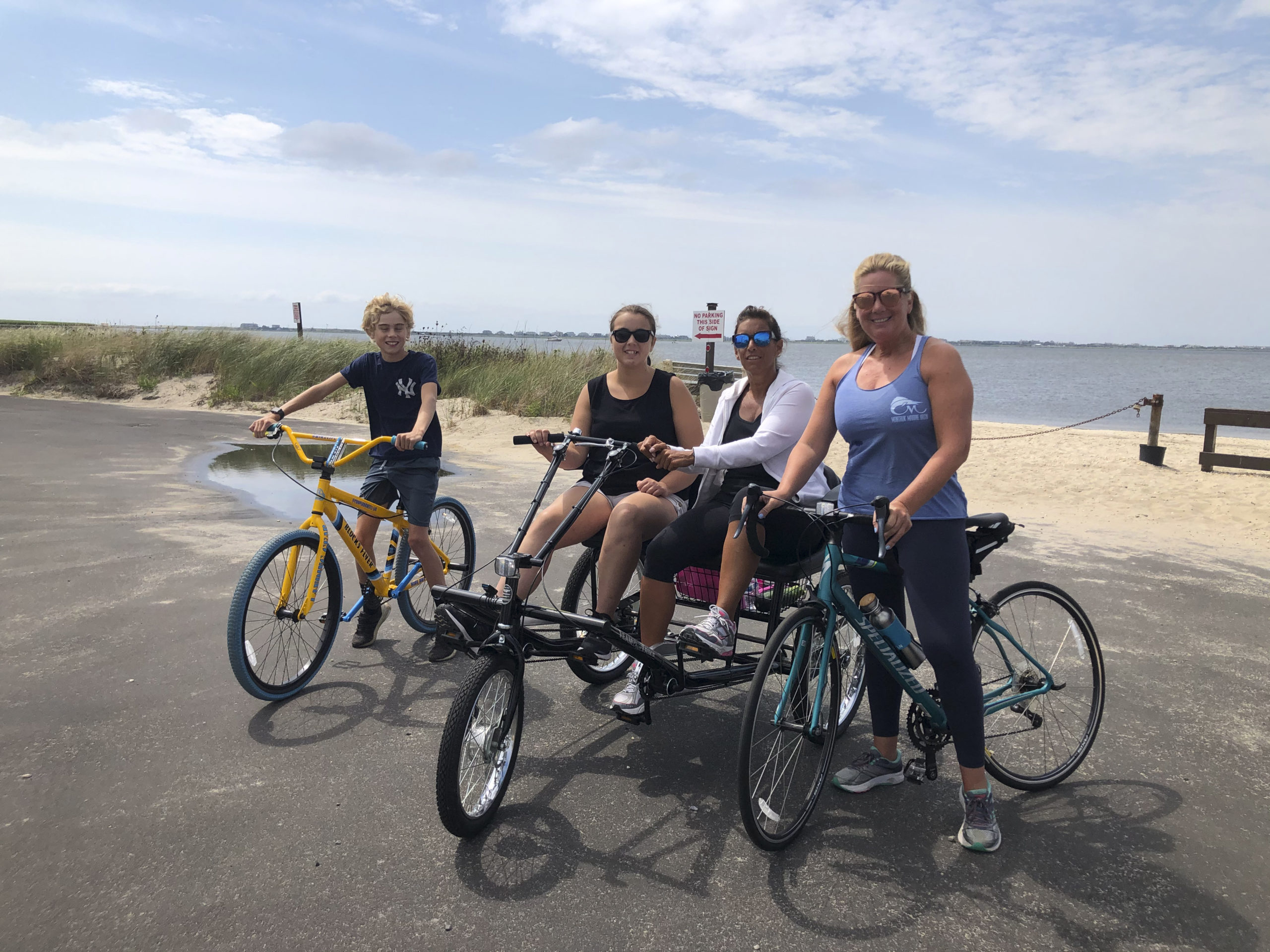 Anna and Patty Tuzzolo, center, with Tara Daniels, right, and her son Cooper, left.