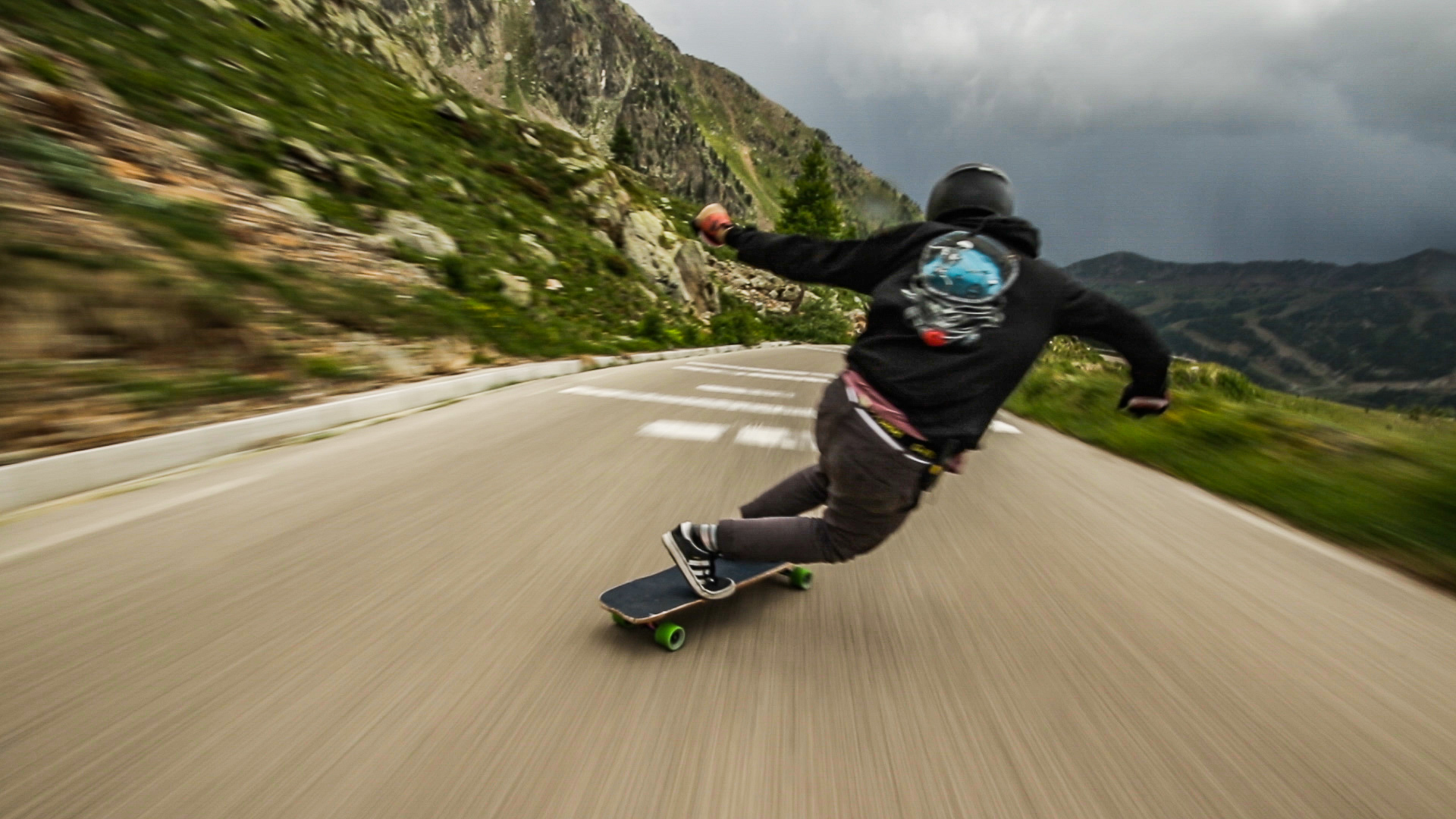 “Raw Run: The Cliffs of France” follows Josh Neuman longboarding down a narrow highway in France.