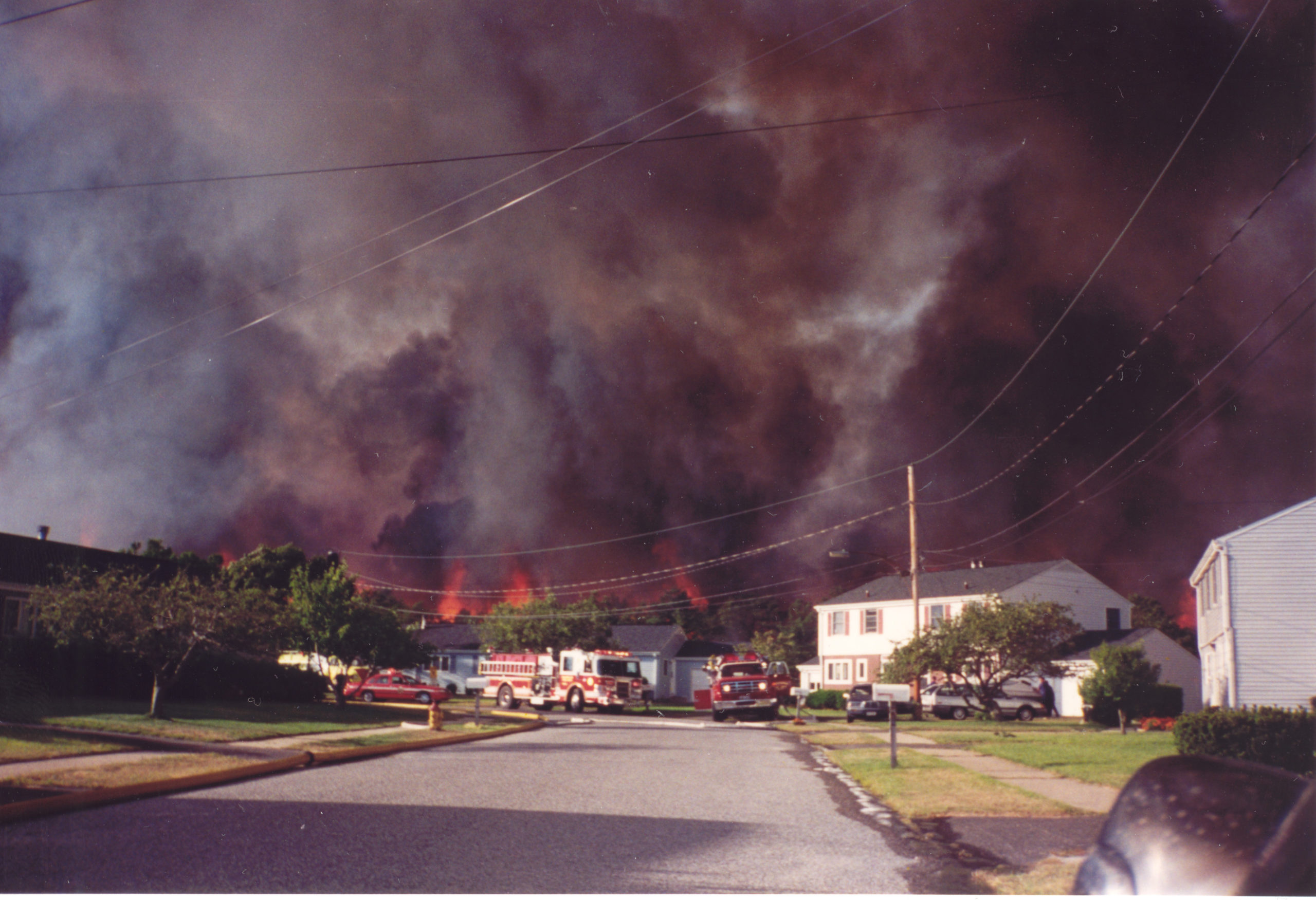 Fire companies from all over Long Island came to fight the wildfires in Westhampton in August of 1995.  COURTESY JIM BAKER.