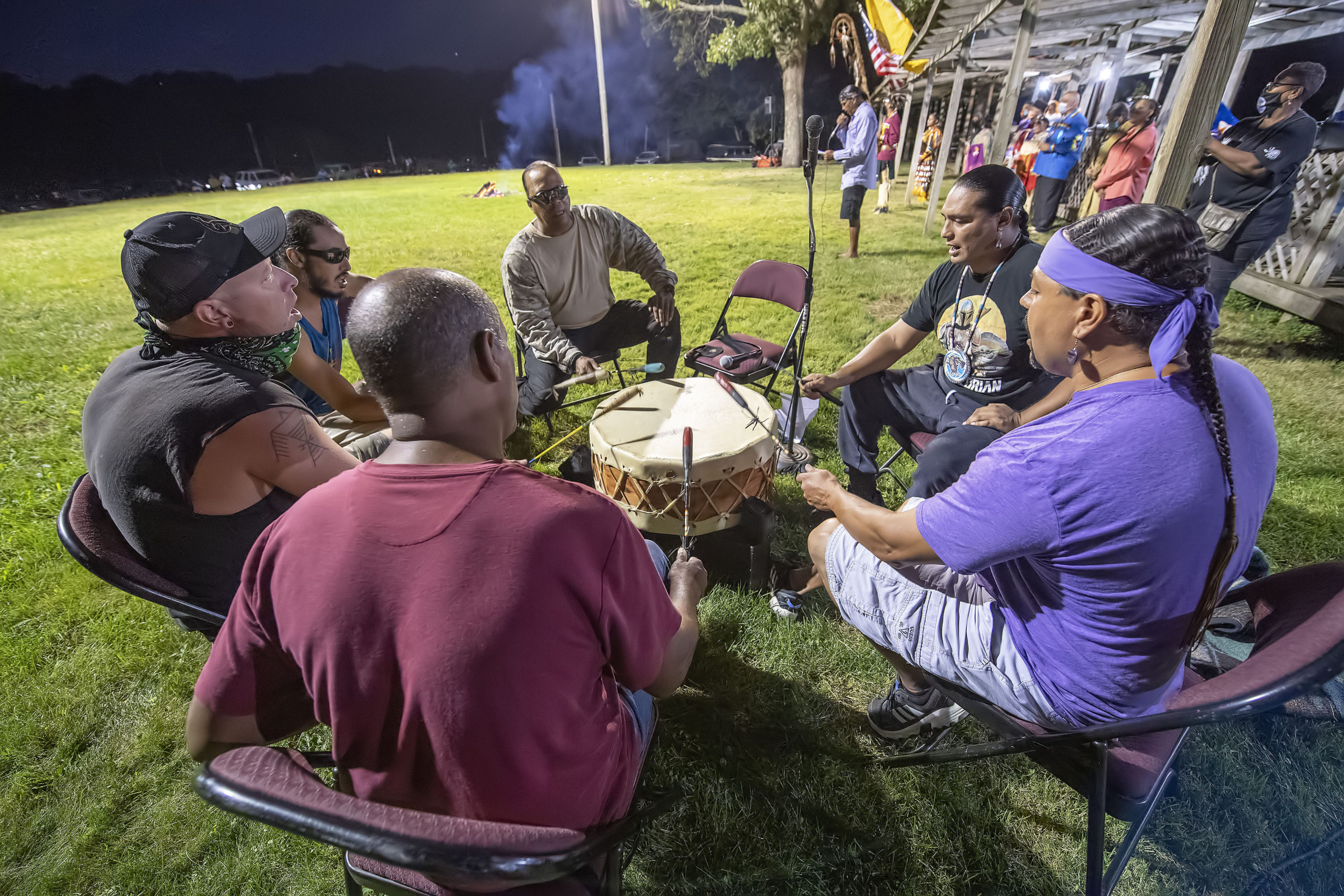 The Youngblood Singers led with songs during the opening ceremony of the 74th annual Shinnecock Indian PowWow on Friday night.