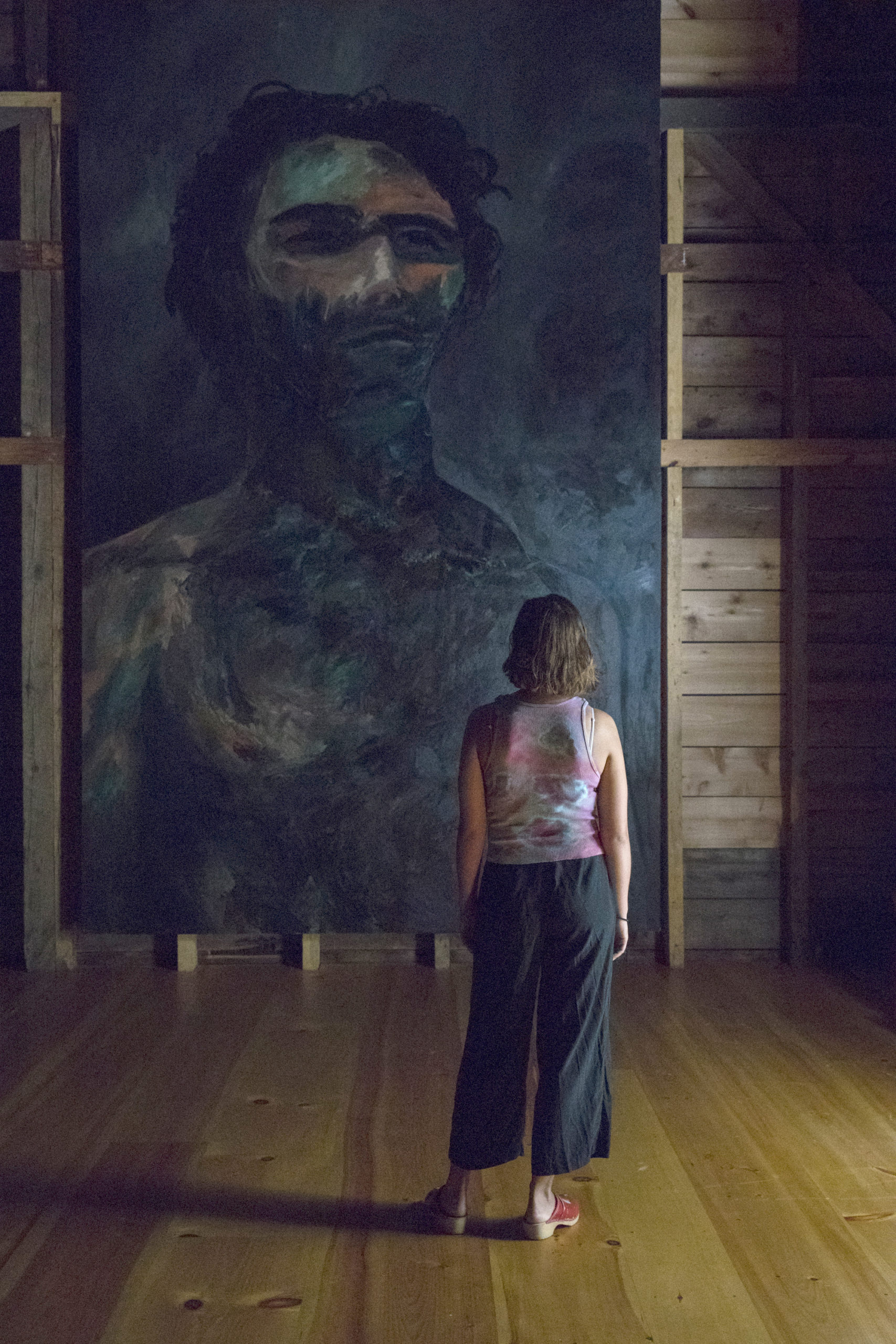 Darius Yektai’s exhibition, Darklight, opened to the public on September 5, at The Arts Center at Duck Creek IN sPRINGS. The exhibit includes six large-scale self portrait paintings.             LORI HAWKINS