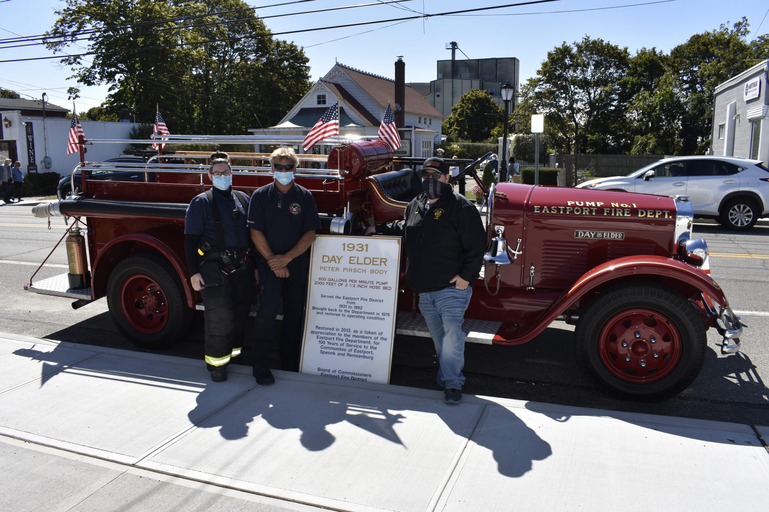 2nd Lt. Melissa Rankin, firefighter Roy Yeagar and Chief Mike Tortorice of the Eastport Fire Department showed off a vintage 1931 Day Elder firetruck.