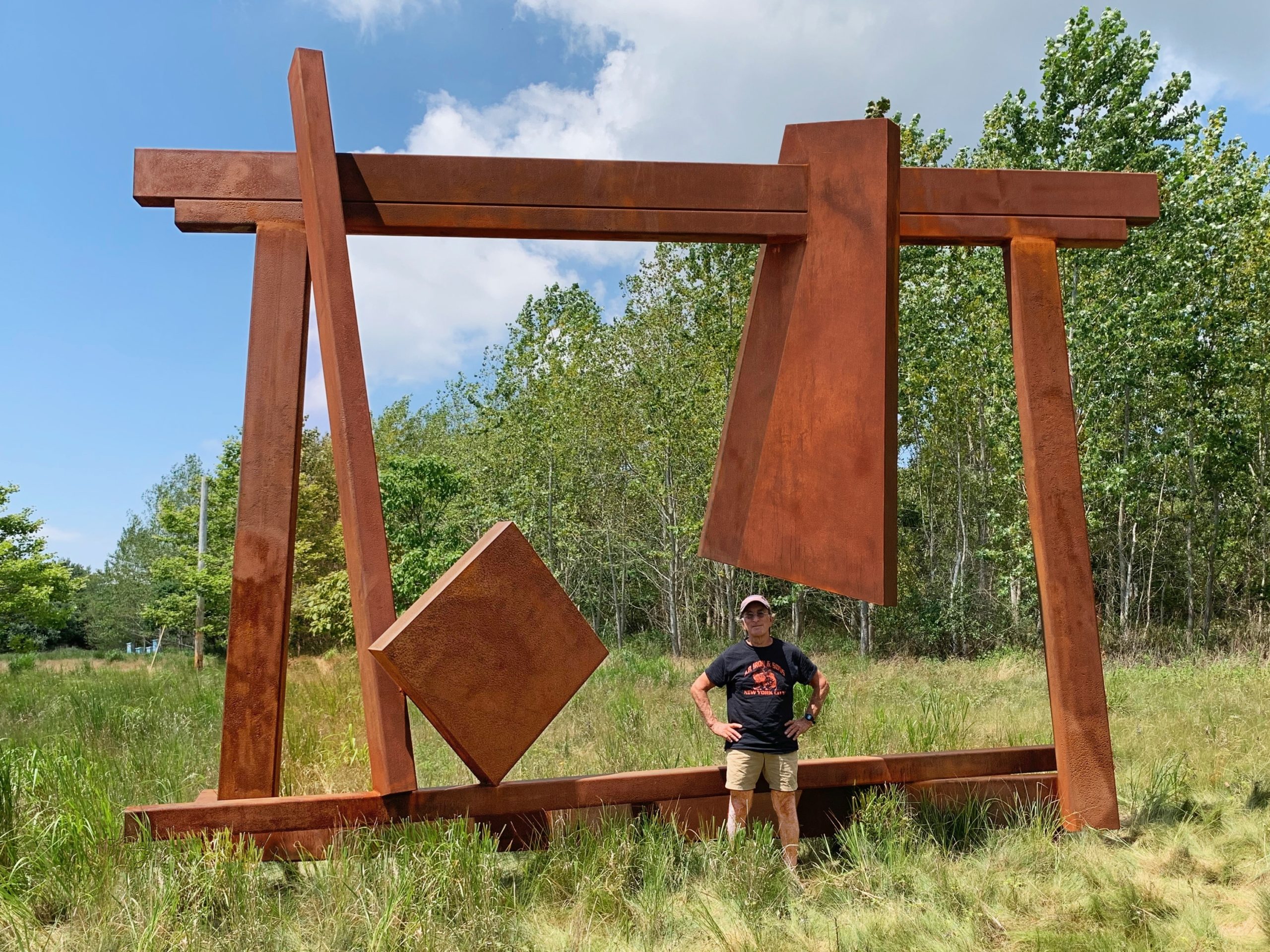 Joel Perlman with his sculpture, 