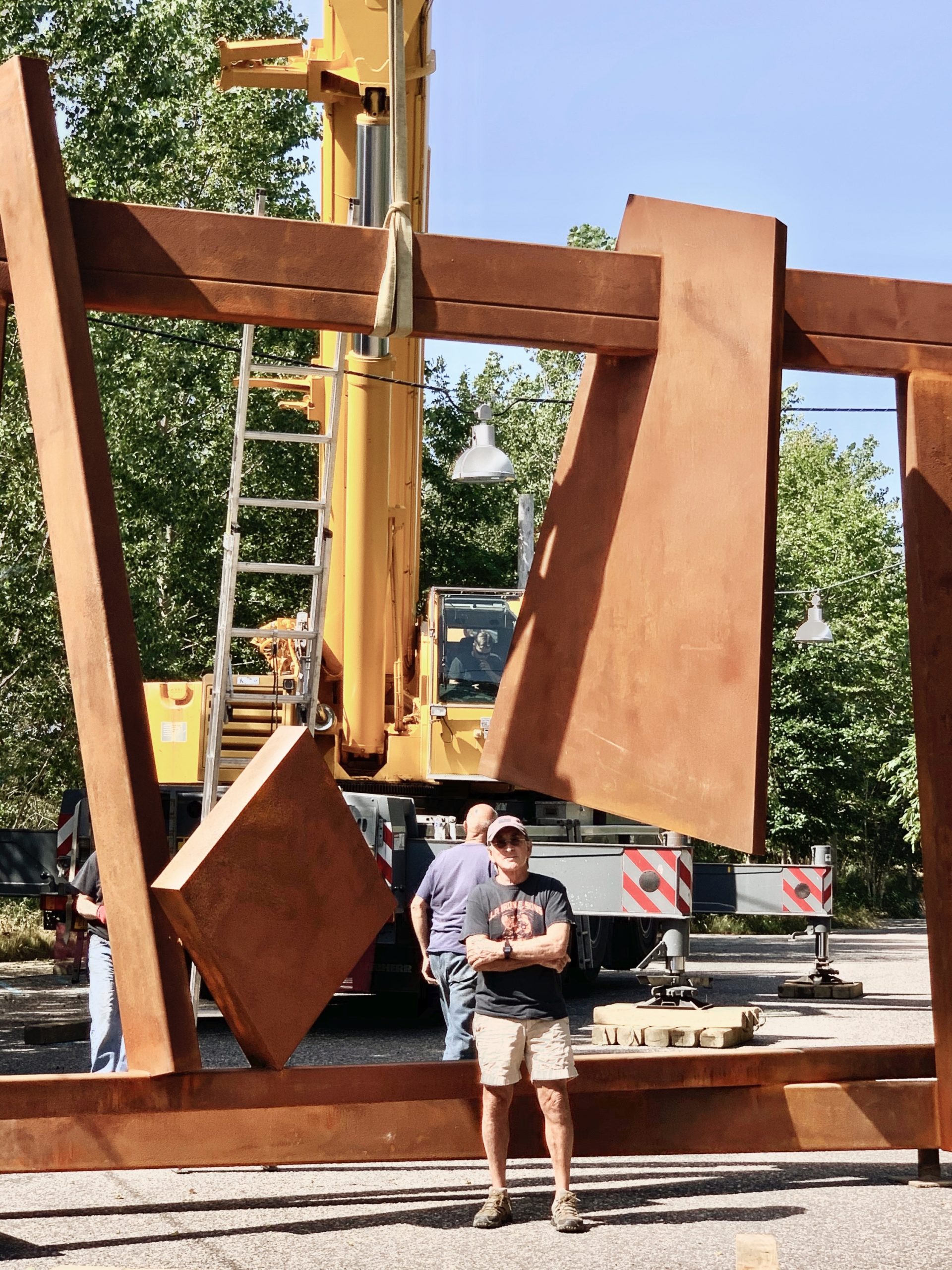 Joel Perlman with his sculpture, 