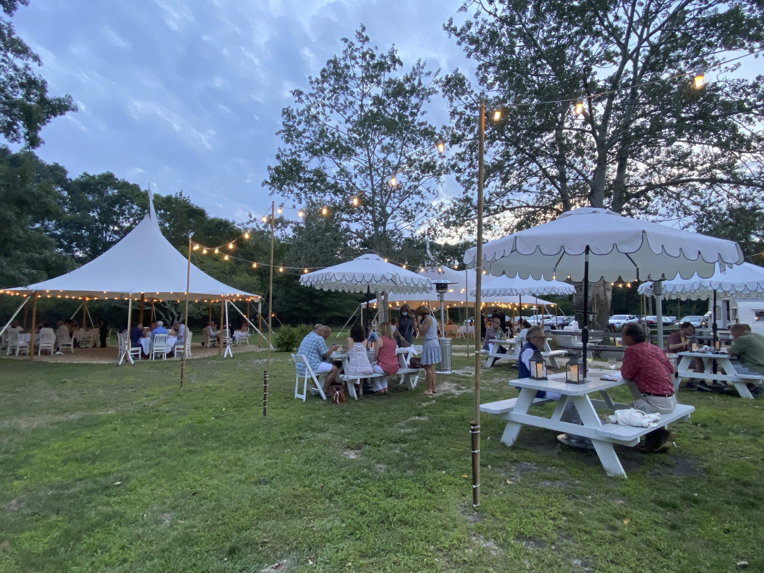 The Stone Creek Inn in Quogue expanded its outdoor dining space to accommodate guest during the summer adding tents, lights and a fire pit.     DANA SHAW