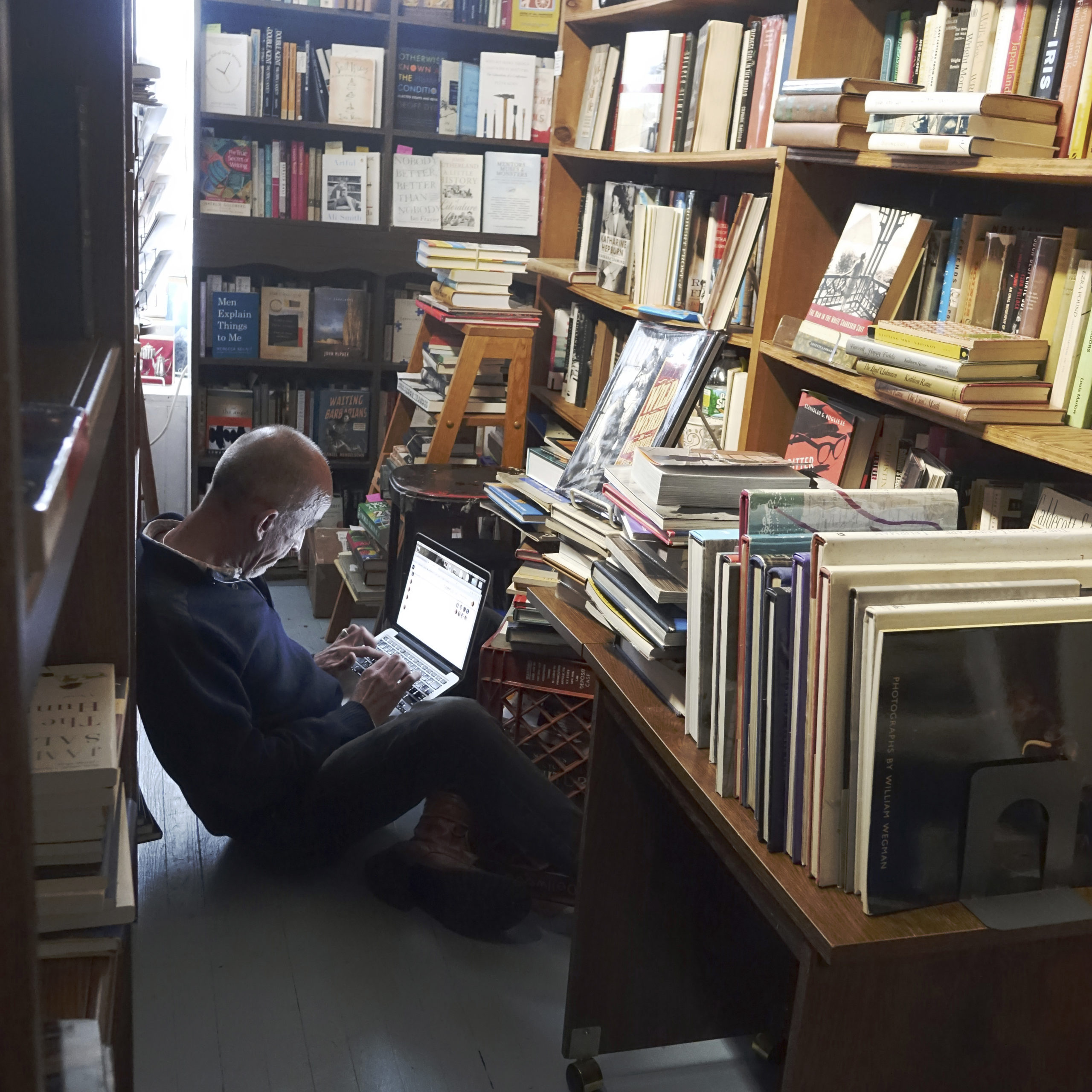 Mark Doty finds a quiet place to work in the stacks at Canio's.      KATHRYN SZOKA