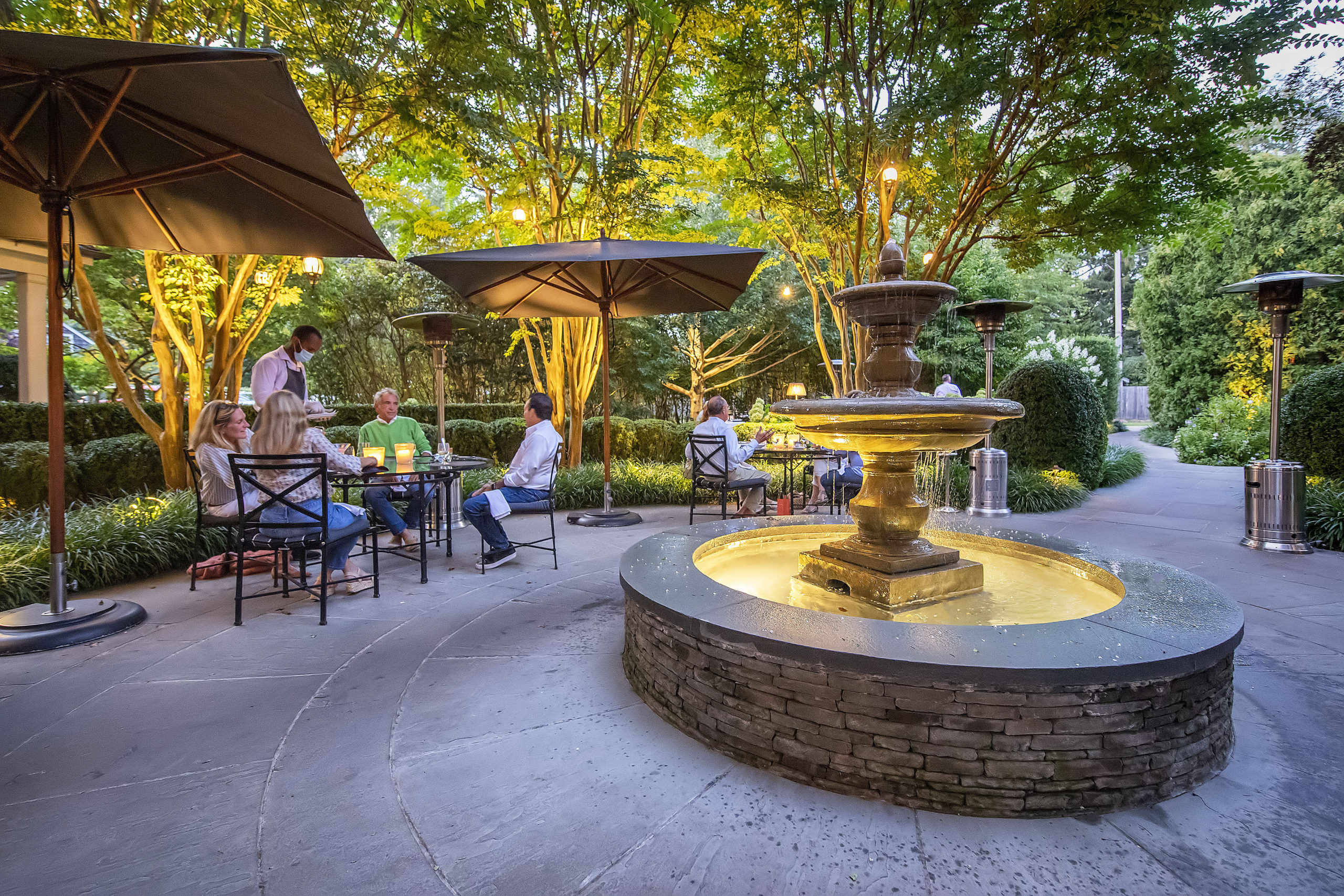 The outdoor dining space in the gardens behind the 1770 House restaurant in East Hampton created in response to the COVID-19 pandemic.  MICHAEL HELLER