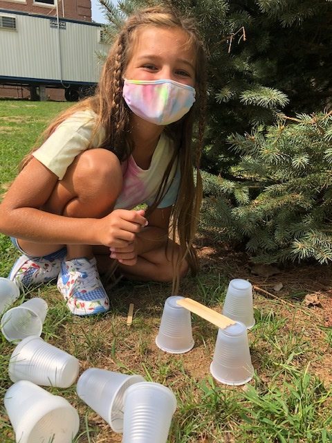 Bridgehampton School third grader Savanna Lillie built a tower with plastic cups.