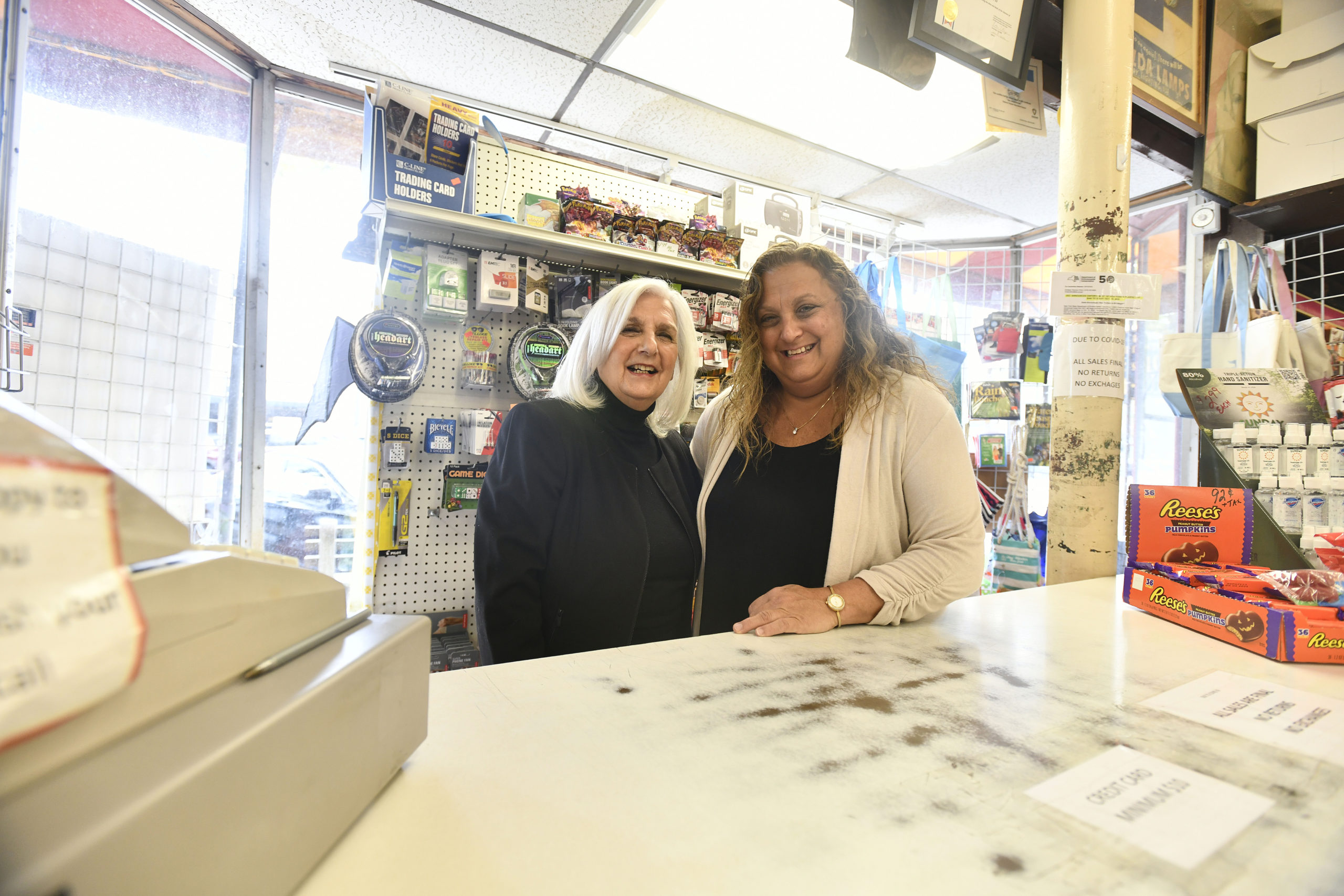 Roseann Bucking and Lisa Field behind the counter at the Sag Harbor Vaiety Store.    DANA SHAW