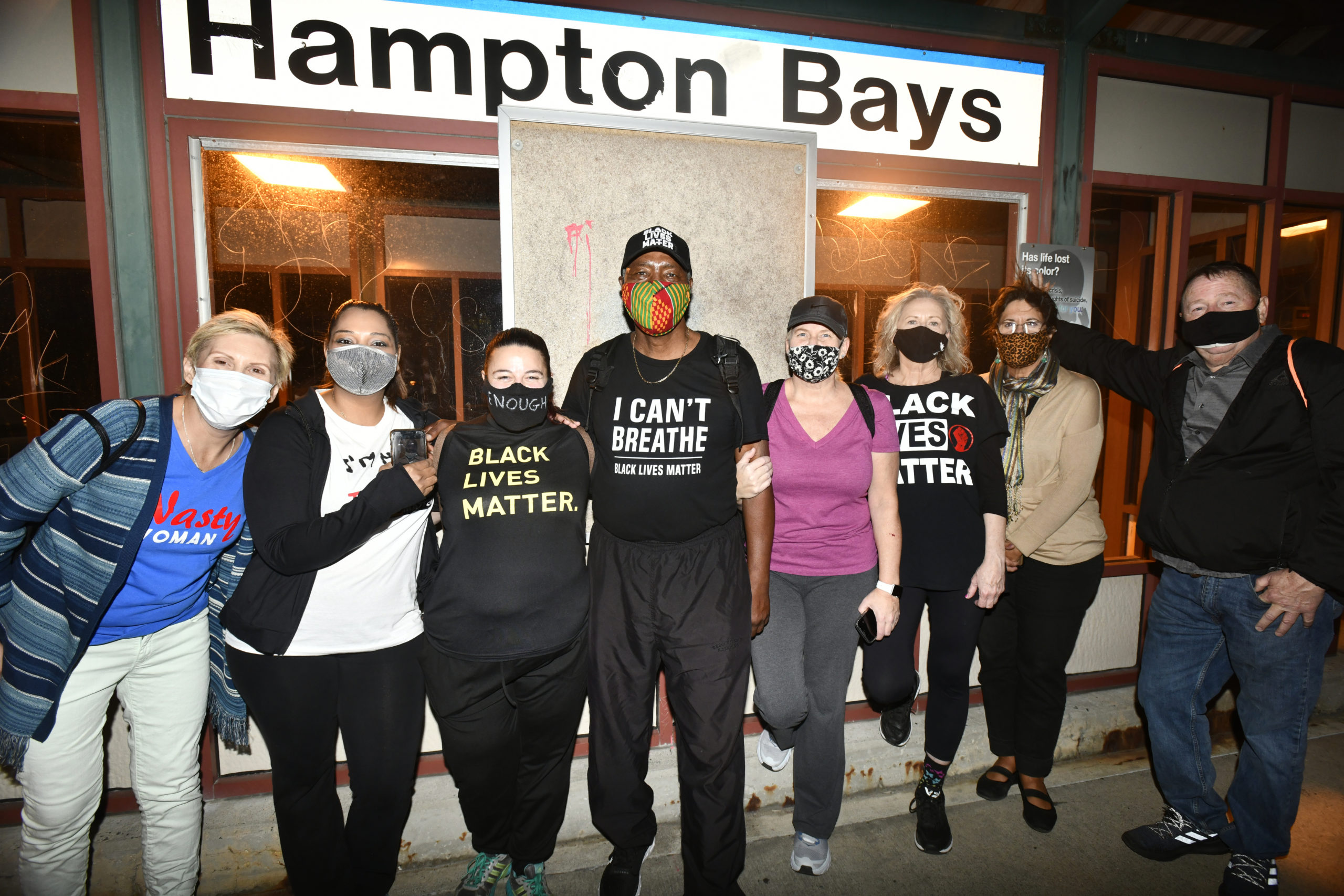 Leon Goodman and the group who walked with him on Sunday at the Hampton Bays train station.  DANA SHAW