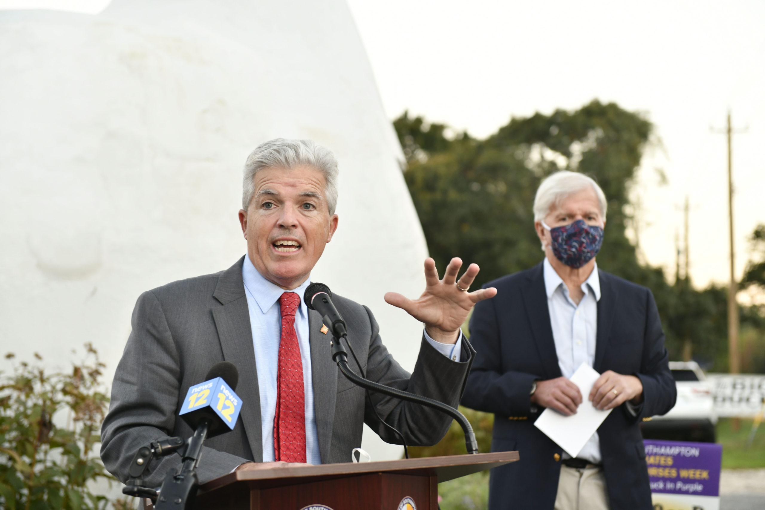 Suffolk County Executive Steve Bellone speaks at the lighting of the Big Duck on October 14, in honor of Emergency Nurses Week.   DANA SHAW