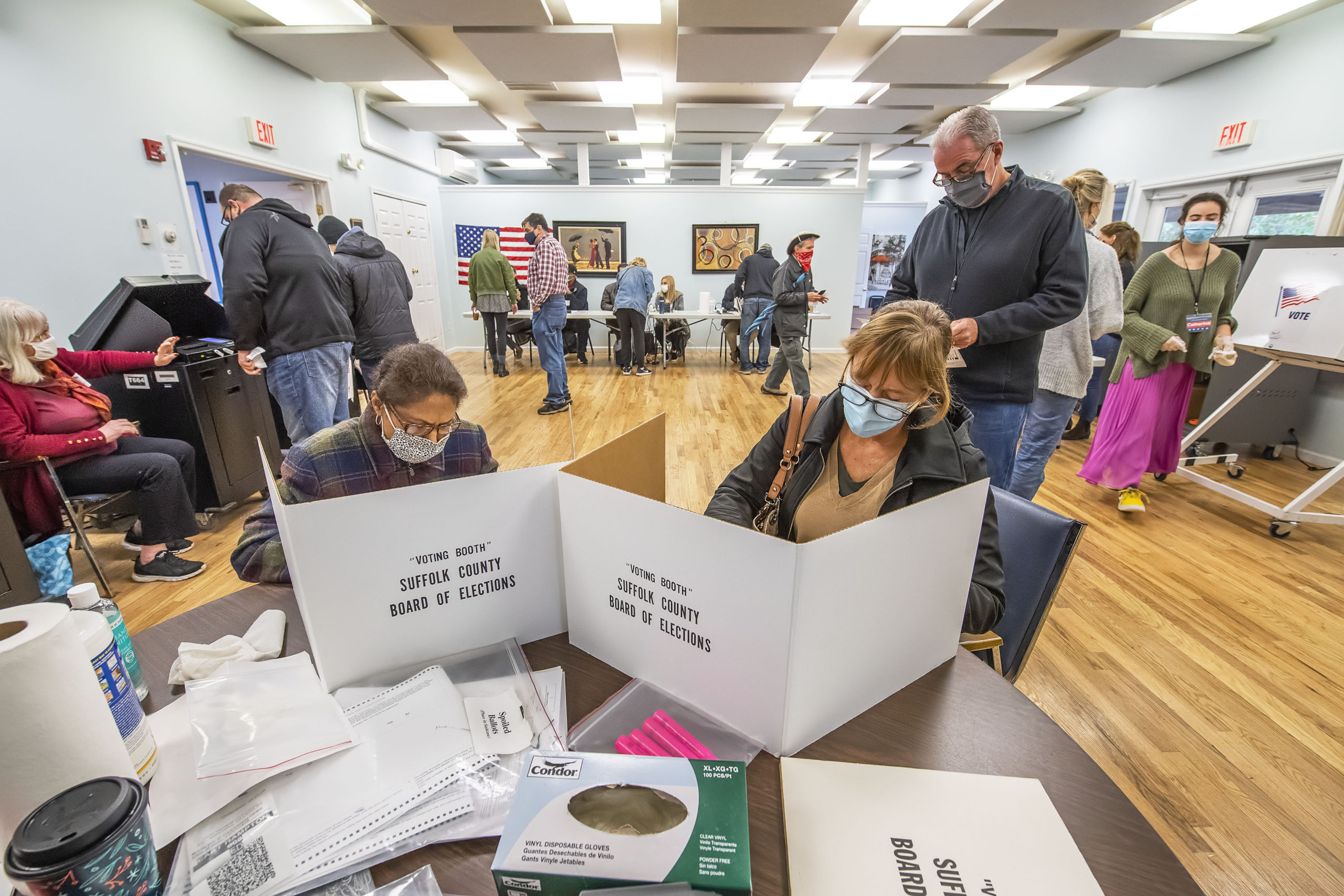 Voters cast their ballots as part of Early Voting in East Hampton Town at the Windmill Village complex on Accabonac Road on Monday morning.     MICHAEL HELLER