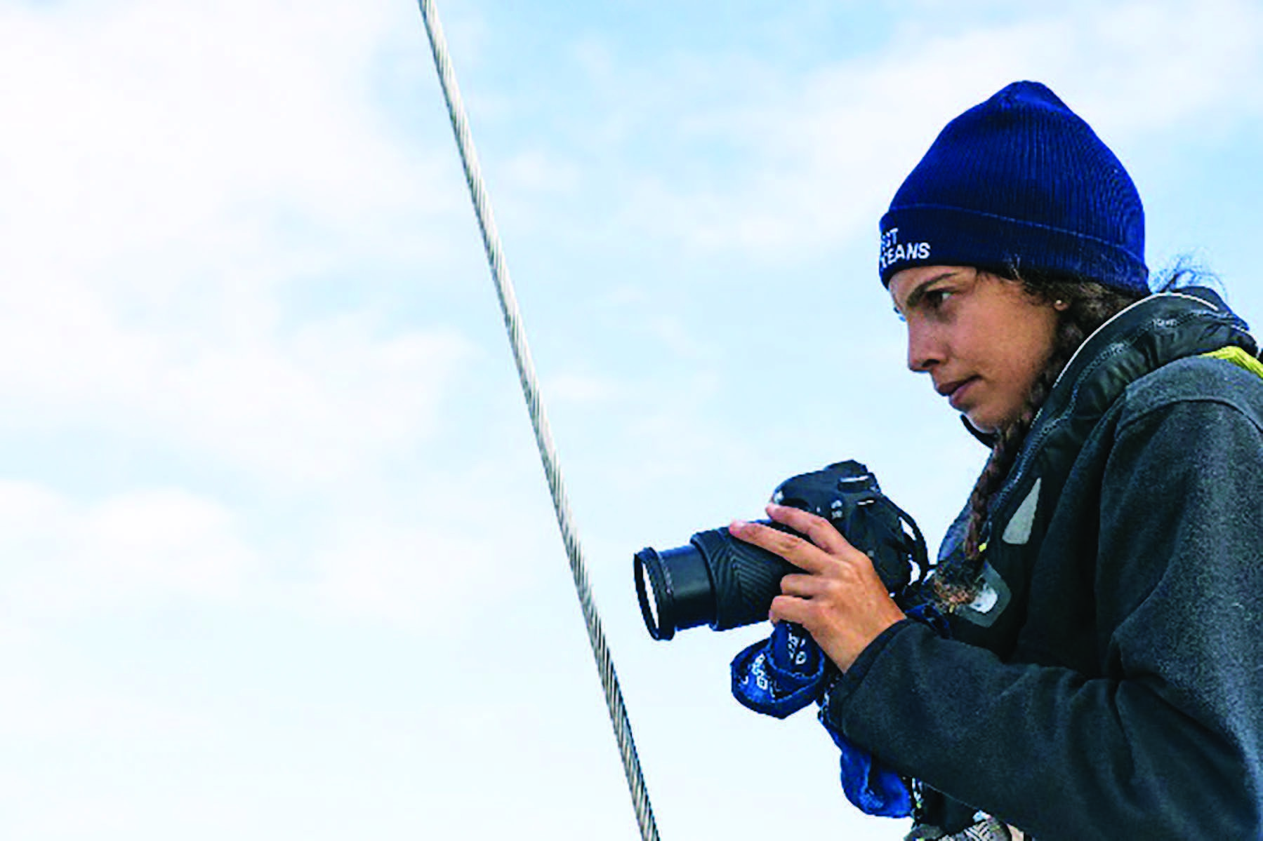 Erica Cirino documenting plastic pollution in the Atlantic Ocean while sailing with eXXpedition.