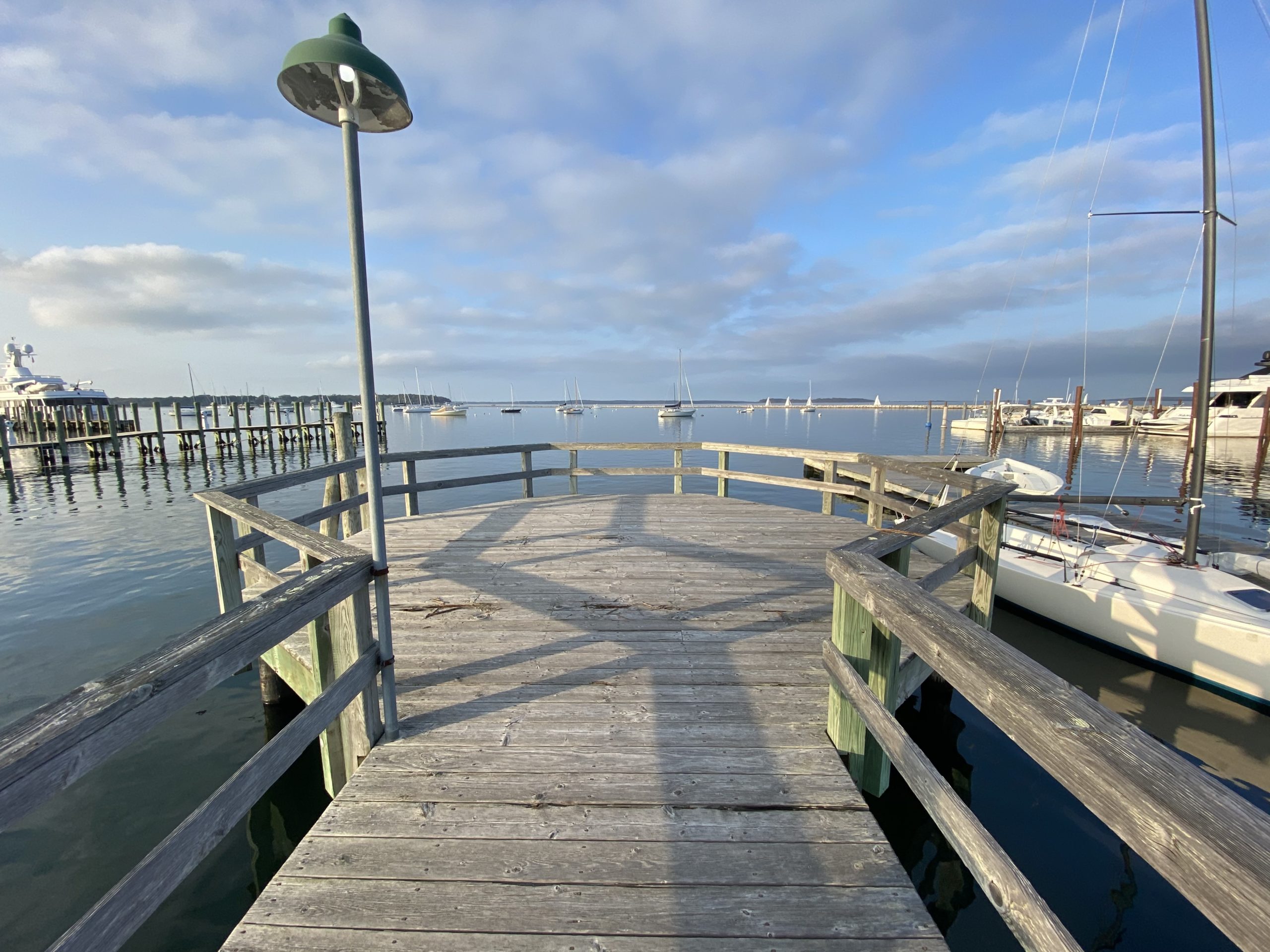 A viewing platform at the end of a public pier in Sag Harbor that will be removed to provide more space to dock sailboats owned by the Breakwater Yacht Club. DANA SHAW 