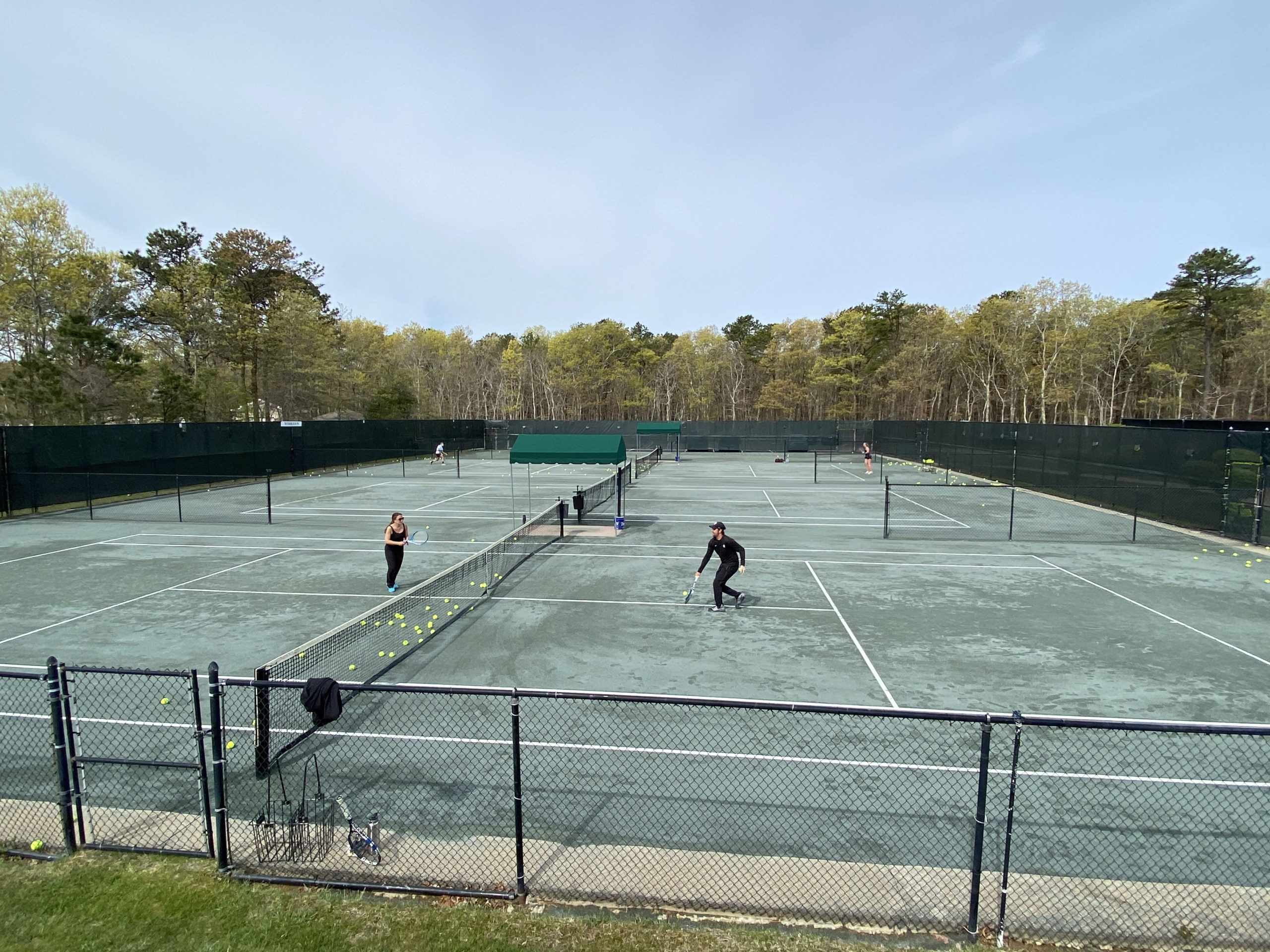 Tennis palyers practice at East Hampton Indoor Tennis ealier this summer.   DANA SHAw