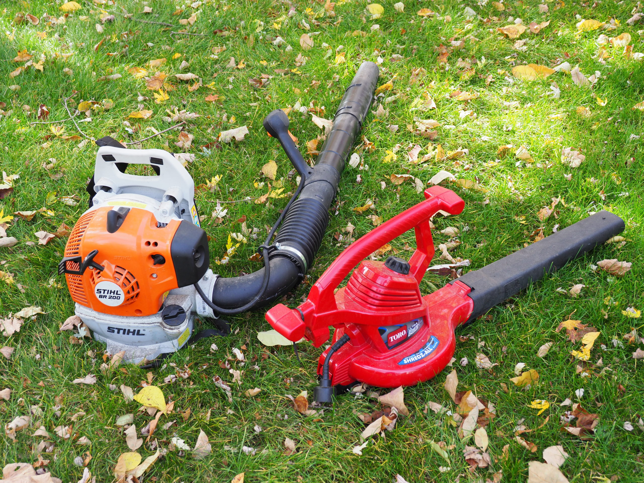 On the left, a small and lightweight 2-cycle leaf blower. The one on the right is a corded electric blower/shredder that cost less than a third of the gas blower, blows nearly as well but unlike the gas one the electric can shred the leaves it collects and it weighs 40 percent less. However, it’s only good for about 100 feet from your electric outlet.