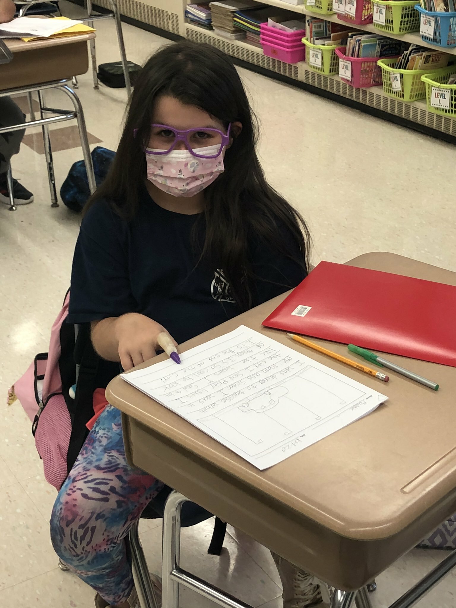 Phillips Avenue Elementary School third graders recently practiced their editing skills while wearing witch fingers and neon glasses. 