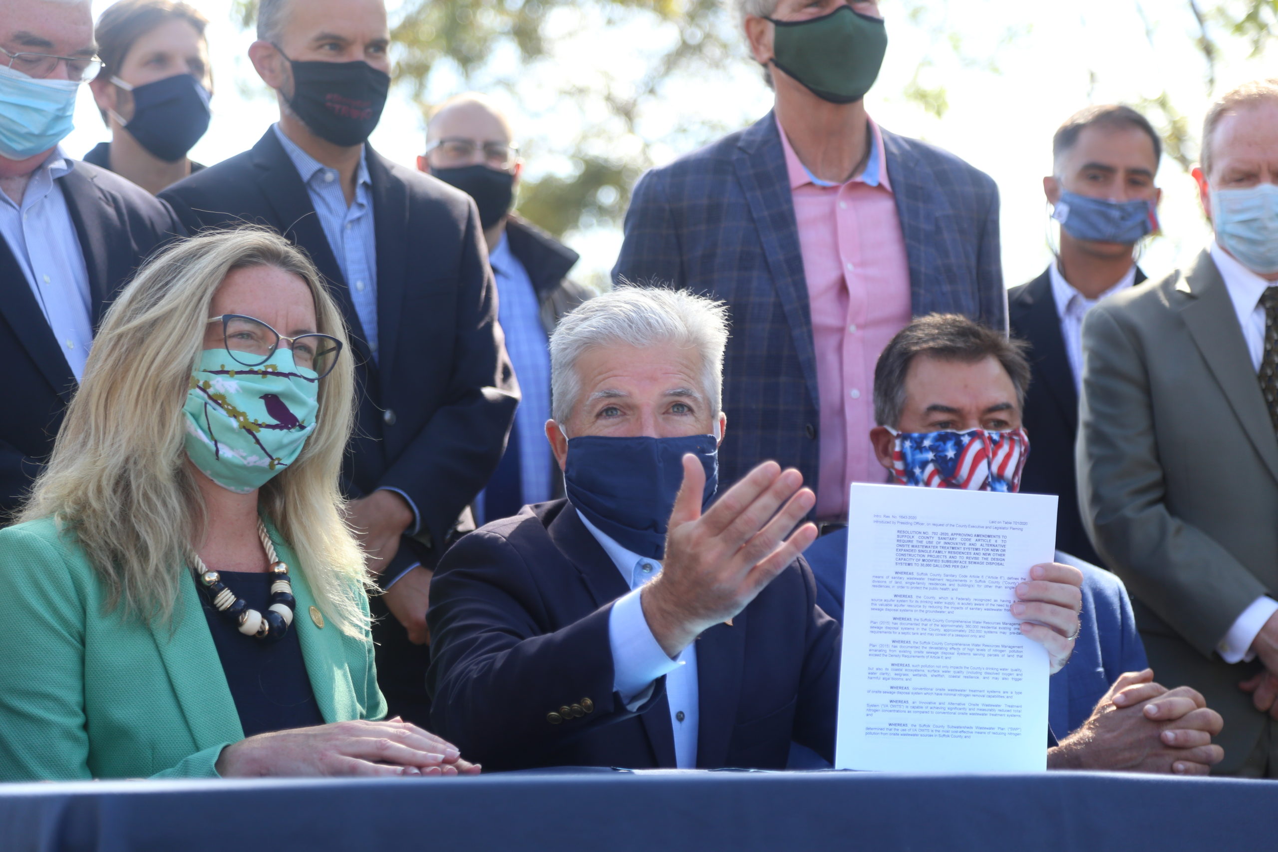Suffolk County Executive Steve Bellone signs legislation requiting I/A septic systems for new home construction.