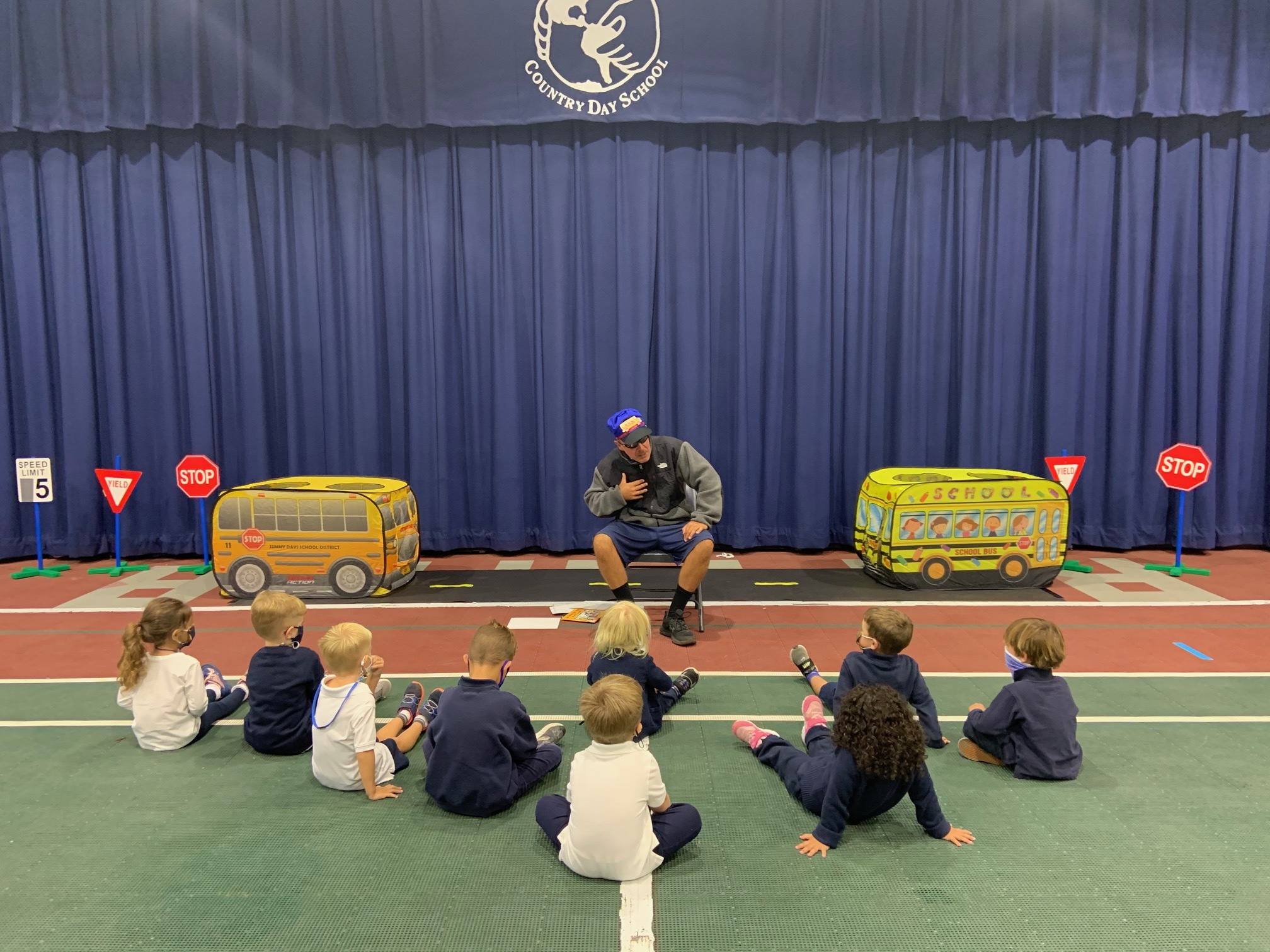 Raynor Country Day School students enjoy a Bus Safety presentation courtesy of Physical Education and Health teacher, Erik Broskie.