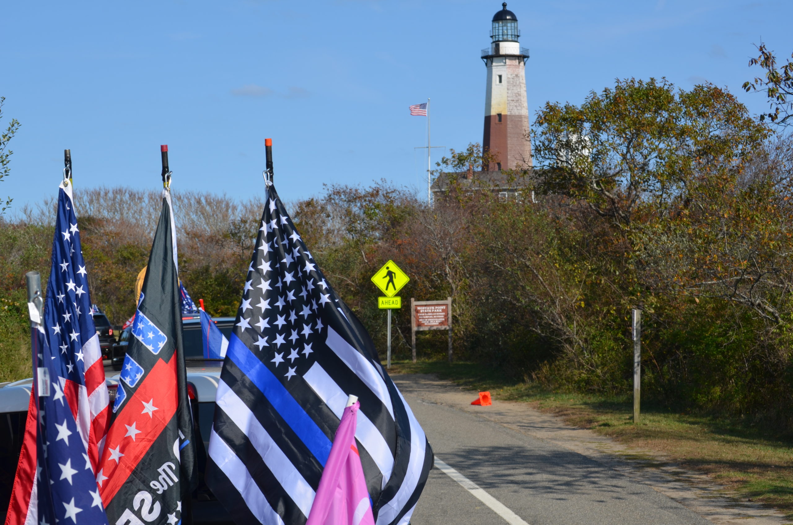 The parade passes the Montauk Lighthouse on October 18. 