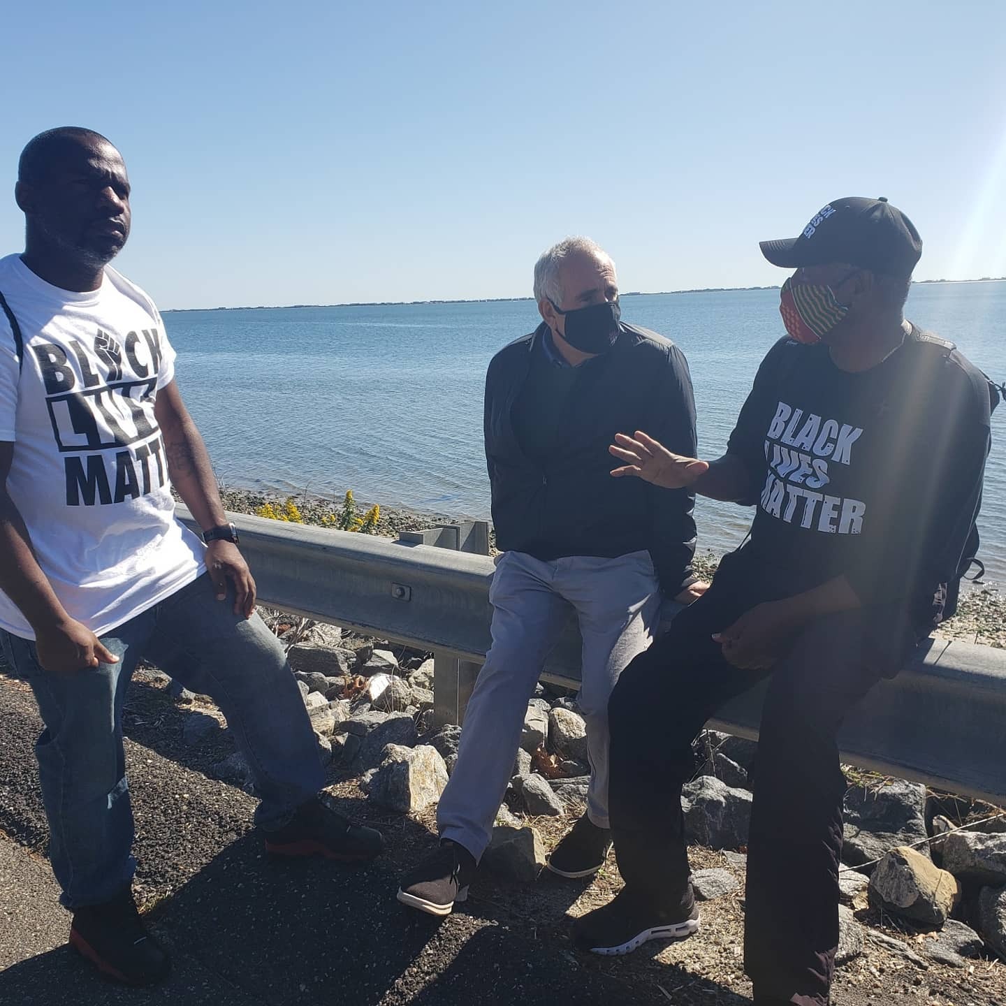 Local activist Willie Jenkins, Southampton Town Supervisor Jay Schneiderman, and Leon Goodman in Hampton Bays on Wednesday. ZOE OKA PHOTO