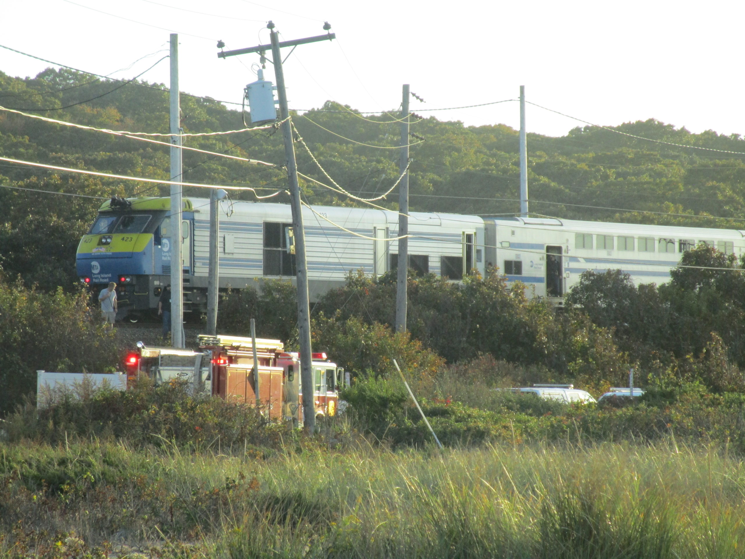 A Long Island Rail Road train stalled near Navy Beach in Montauk, about a mile from its intended destination. The Montauk Fire Department had to be called out to help the 15 passengers aboard disembark via ladder on a steeply sloping track bed. 