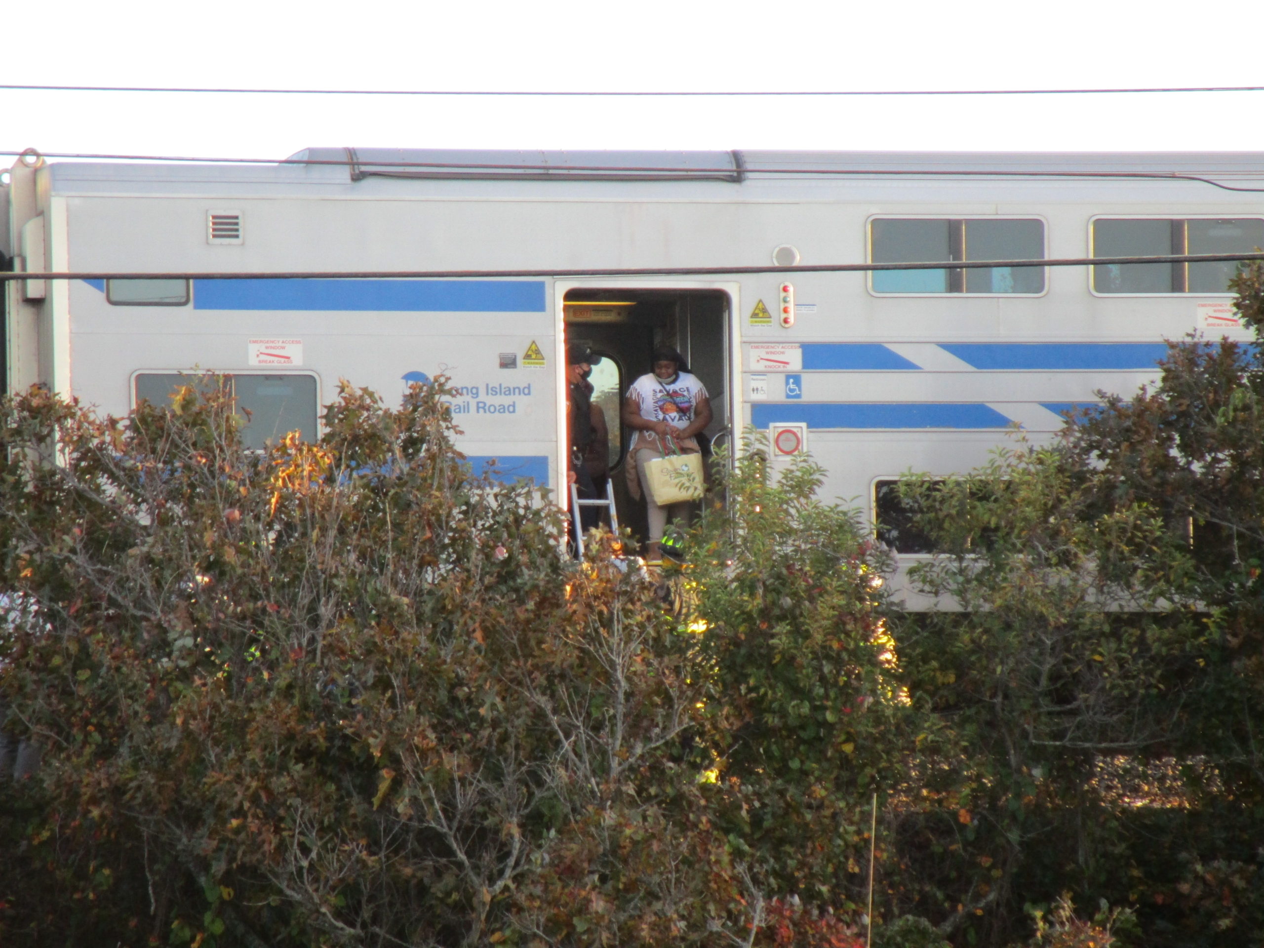 A Long Island Rail Road train stalled near Navy Beach in Montauk, about a mile from its intended destination. The Montauk Fire Department had to be called out to help the 15 passengers aboard disembark via ladder on a steeply sloping track bed. 