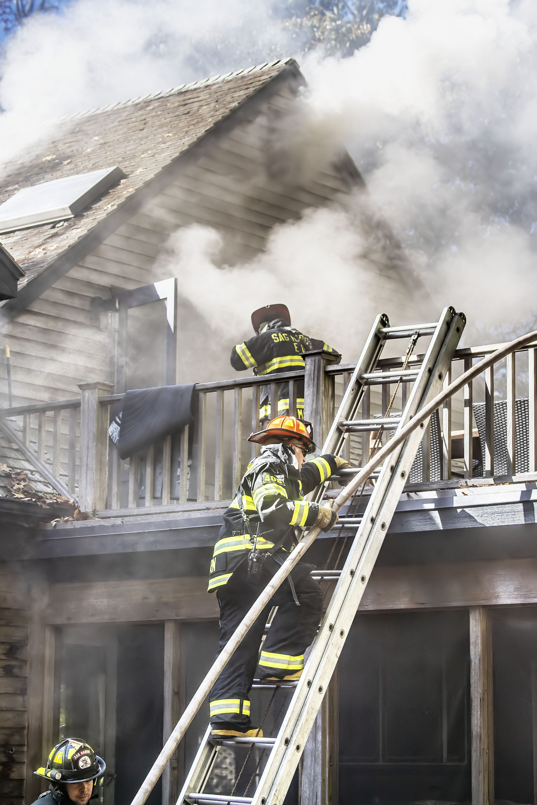 Sag Harbor Fire Department firefighters were assisted by firefighters from the East Hampton, Bridgehampton, North Sea and Southampton Fire Departments as they fought a stubborn blaze in a residence at 148 Harbor Watch Court on Saturday.   MICHAEL HELLER 