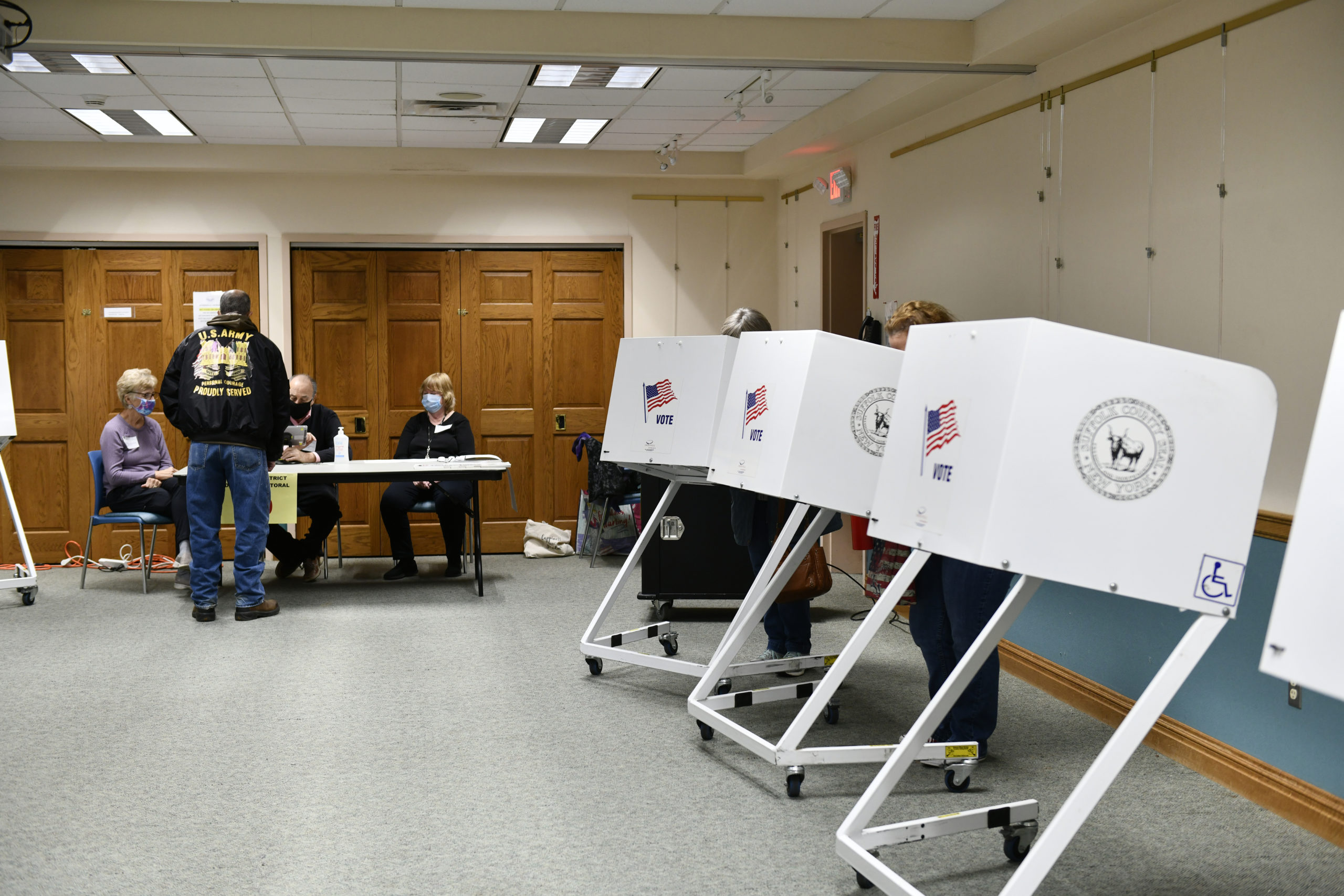 Voting at the Hampton Bays Library this morning.   DANA SHAW