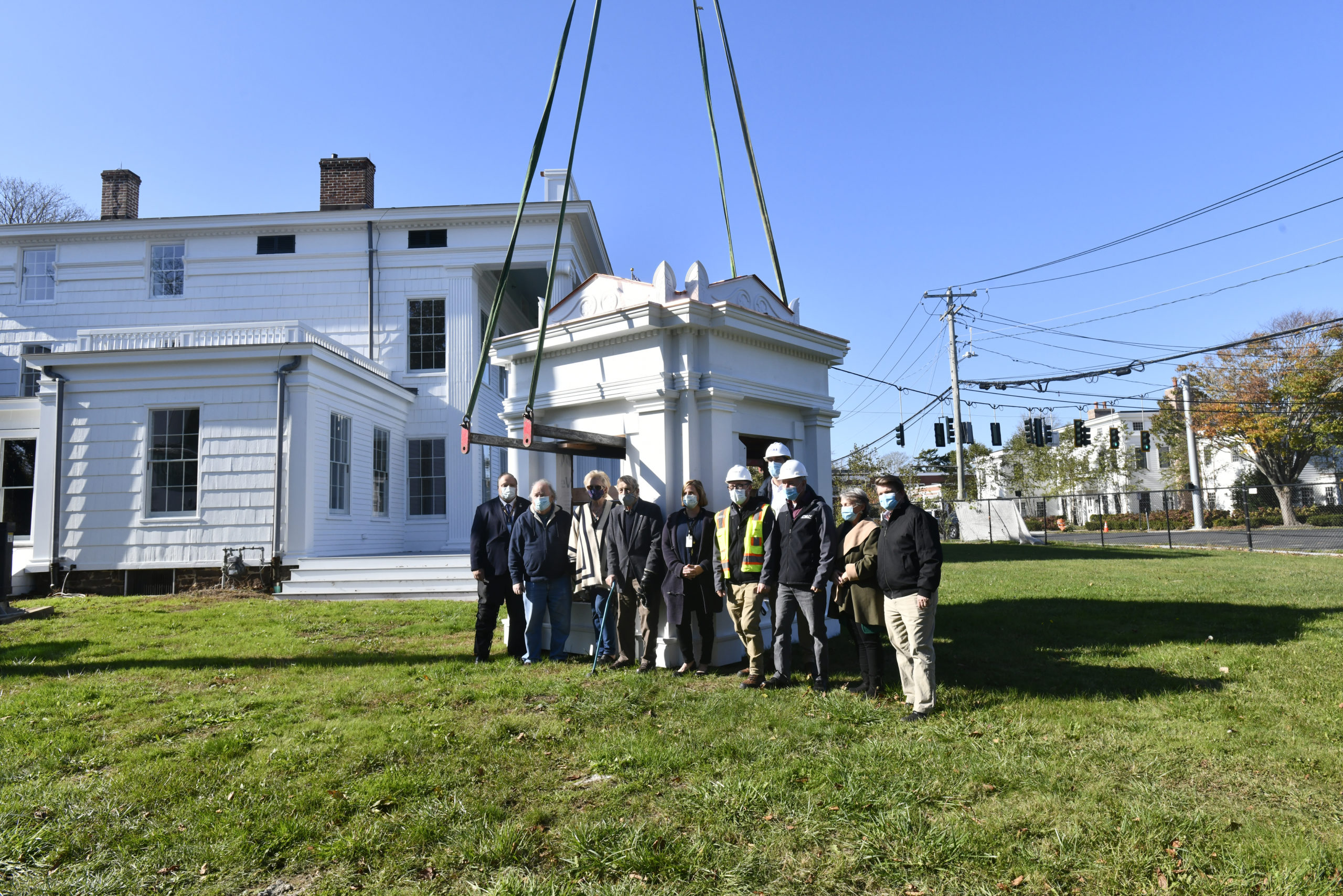 The decorative cupola was placed back on the rooftopof the National Rogers House in Bridgehampton.   DANA SHAW