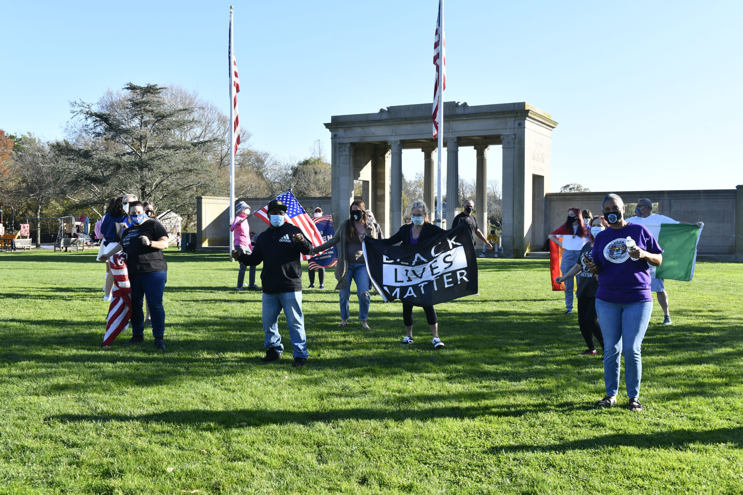 Joe Biden supporters celebrate his victory in Agawam Park on Sunday.   