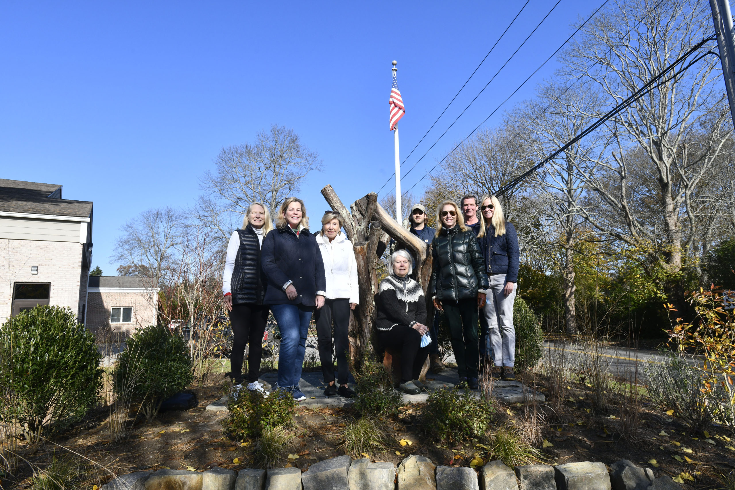 The Southampton Garden Club, along with Jacob Antilety Landscaping, recently revamped the Liberty Garden located at the Southampton Fire Station on the corner of Montauk Highway and St. Andrews Road. The Liberty Garden was created after the September 11, 2001 attacks. The garden now boasts native plants, pollinators and a sculpted yew tree stump. In the garden, left to right are, Helene Fagan Barbara Glatt, Christl Meszkat, Lydia Wallis, Alex Antilety, Sacha MacNaughton, Mark Antilety and Deborah De La Gueronniere.     DANA SHAW