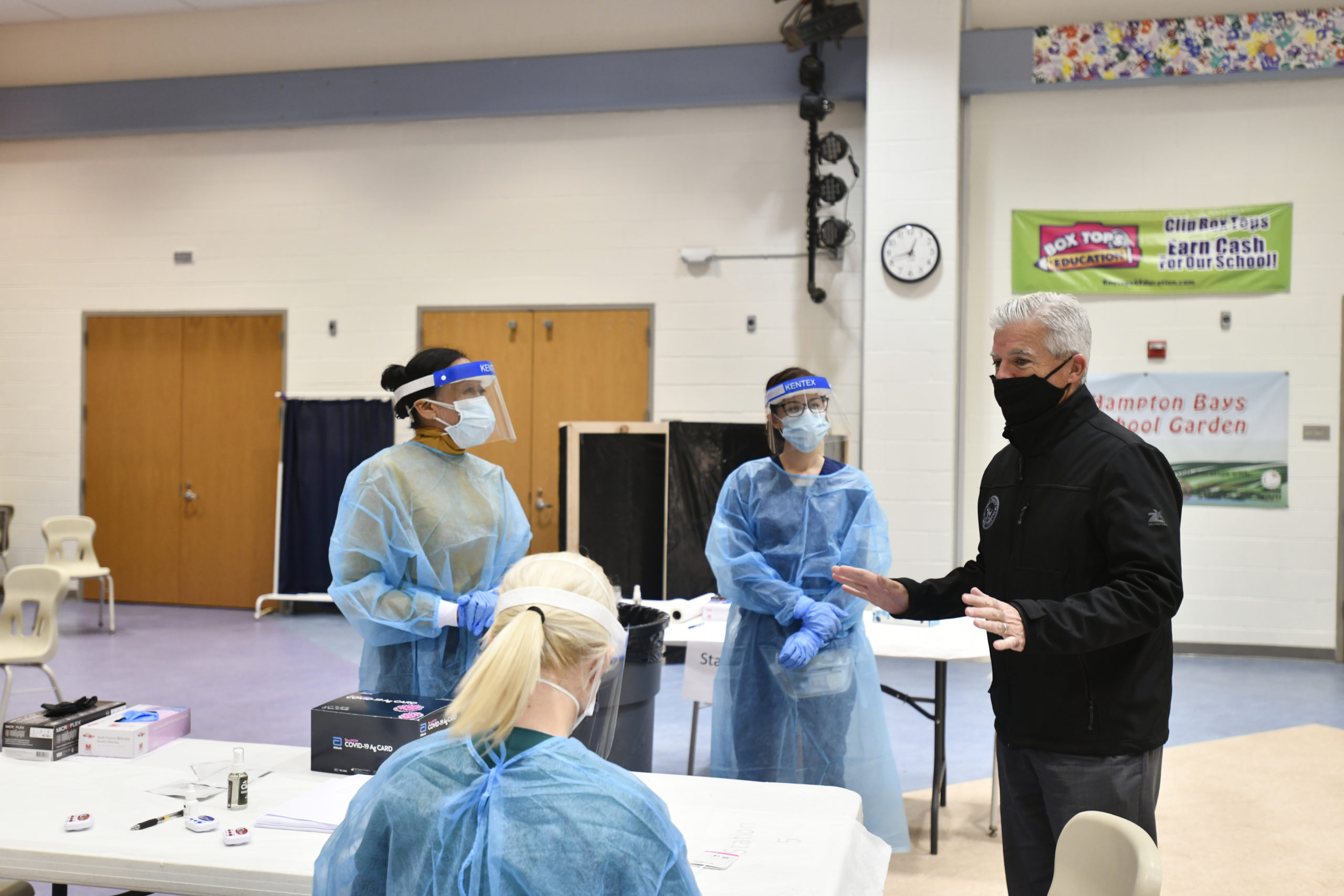 Suffolk County Executive Steve Bellone visited Hampton Bays Middle School on Thursday to check out the testing facility.   DANA SHAW