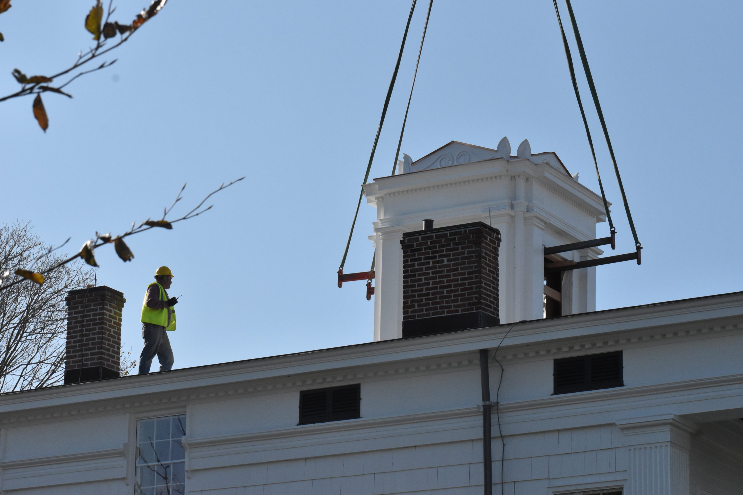 The cupola is lifted to the roof of the Nathaniel Rogers House in Bridgehampton on November 4. STEPHEN J. KOTZ