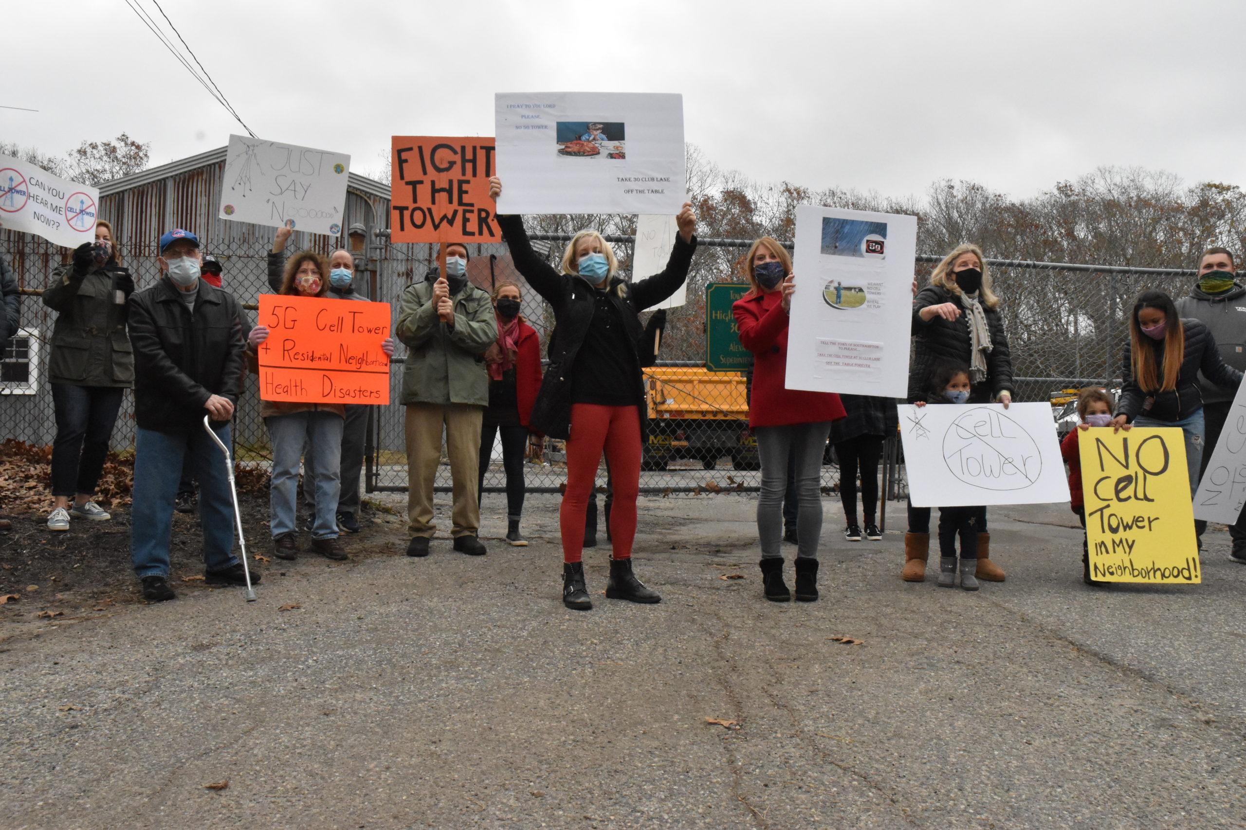 Noyac residents gathered Sunday to protest a proposal to build a cell tower at the Southampton Town Highway Department property at 30 Club Lane. STEPHEN J. KOTZ