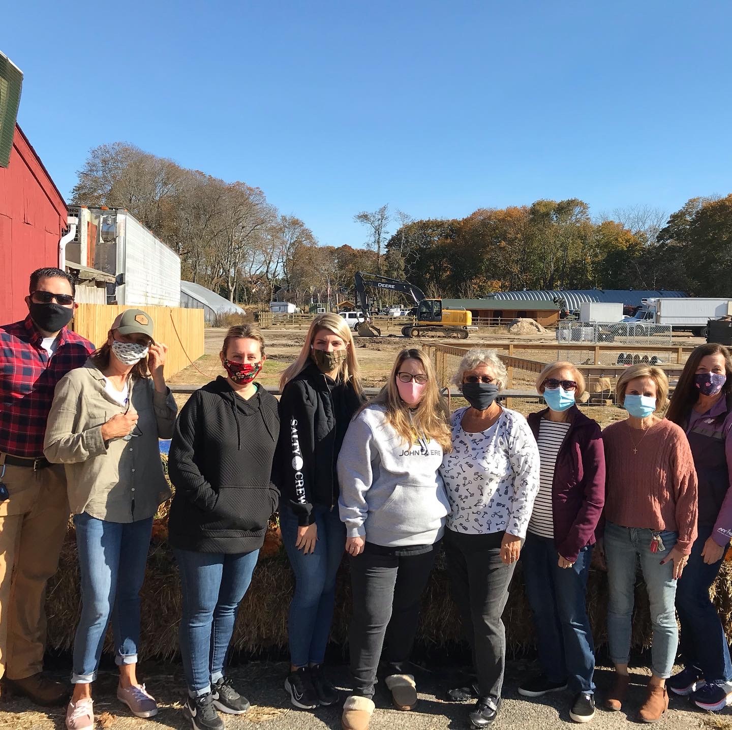 Micah Schlendorf, President of the Eastport Chamber of Commerce with members of the Eastport Green Project and the team from Olish Farms.