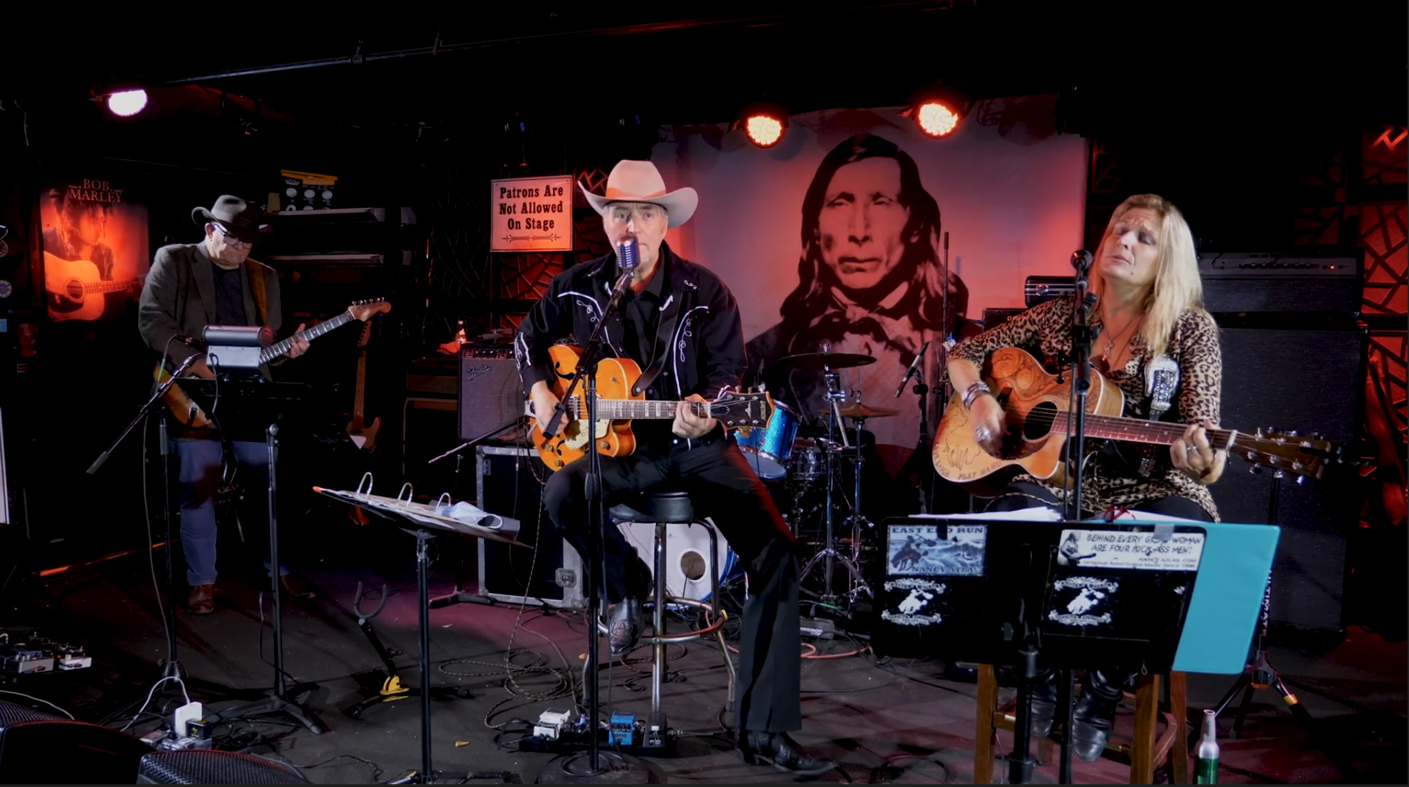 Gene Casey and Nancy Atals performing on The Stephen Taklhouse stage in a still image from an upcoming episode of Friday Night Hustle.