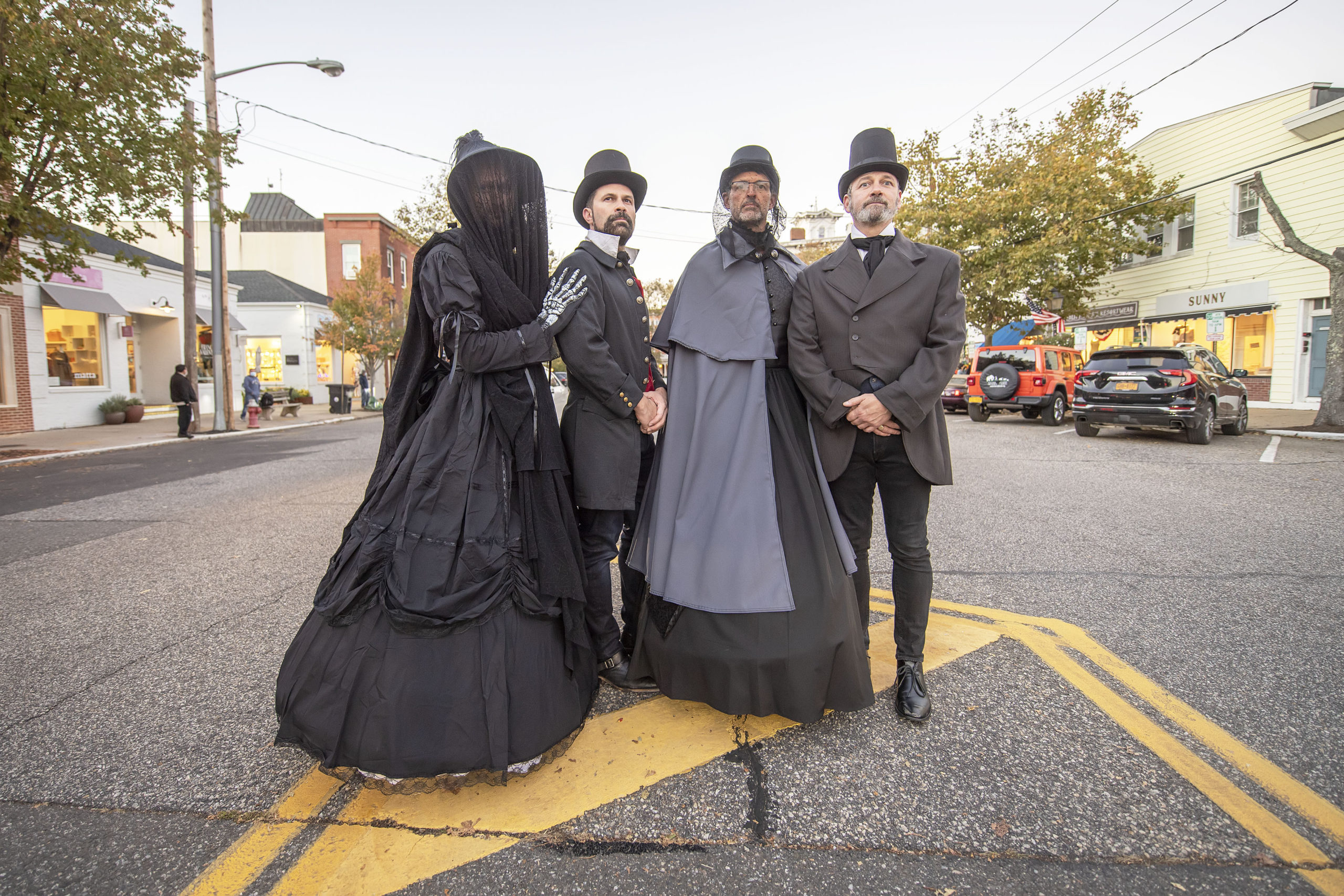 Butch Whitfield, Lindsay Denman, Mike Lambert and Jeremy Leffler made an elegant appearance on Main Street in Sag Harbor on Halloween afternoon.  MICHAEL HELLER