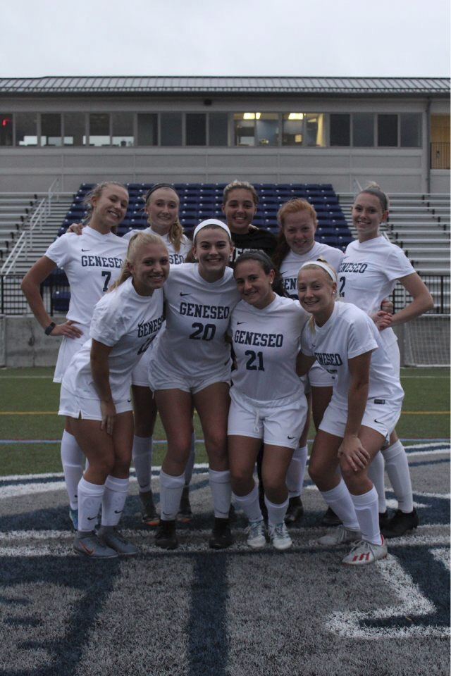 McKinley Skala, far right, bottom row, with her SUNY Geneseo women’s soccer teammates last year. This year, as a sophomore, she’s been dealing with a cancelled fall season and hoping the team can play in the spring.