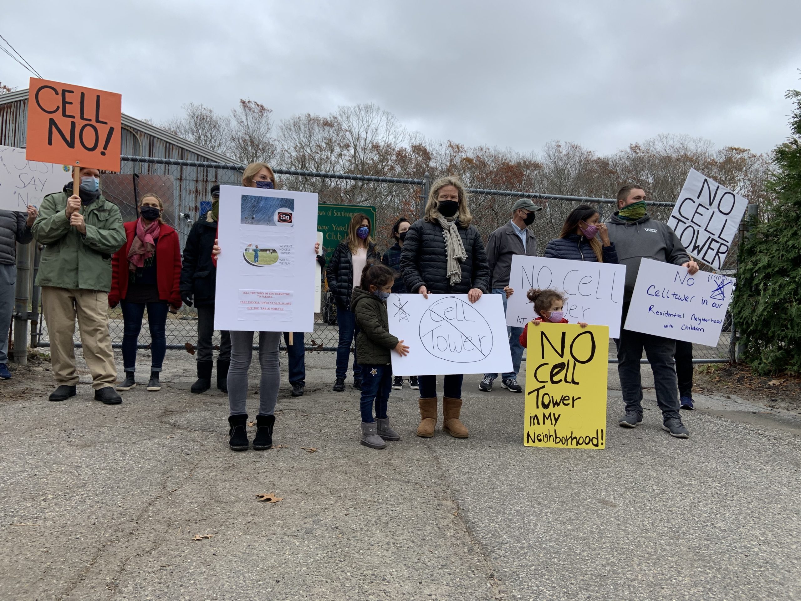 Neighbors gathered at a Southampton Town Highway Department depot at the end of Club Lane in Noyac to protest the possibility of the site being used for a cell tower. STEPHEN J. KOTZ