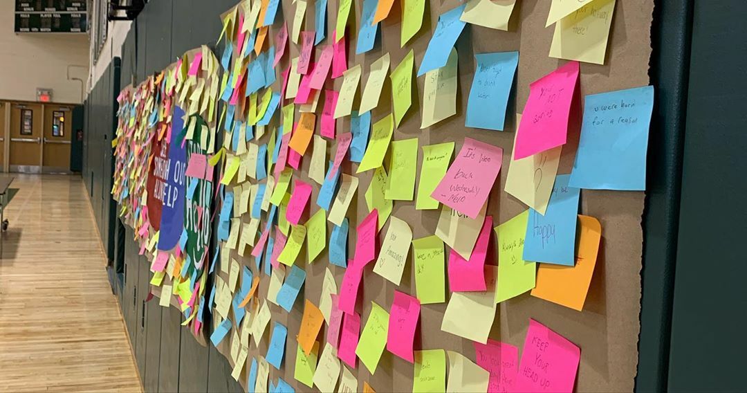 Westhampton Beach High School students shared positive messages on sticky notes as part of the Sandy Hook Start With Hello program, which has been instituted in their school.